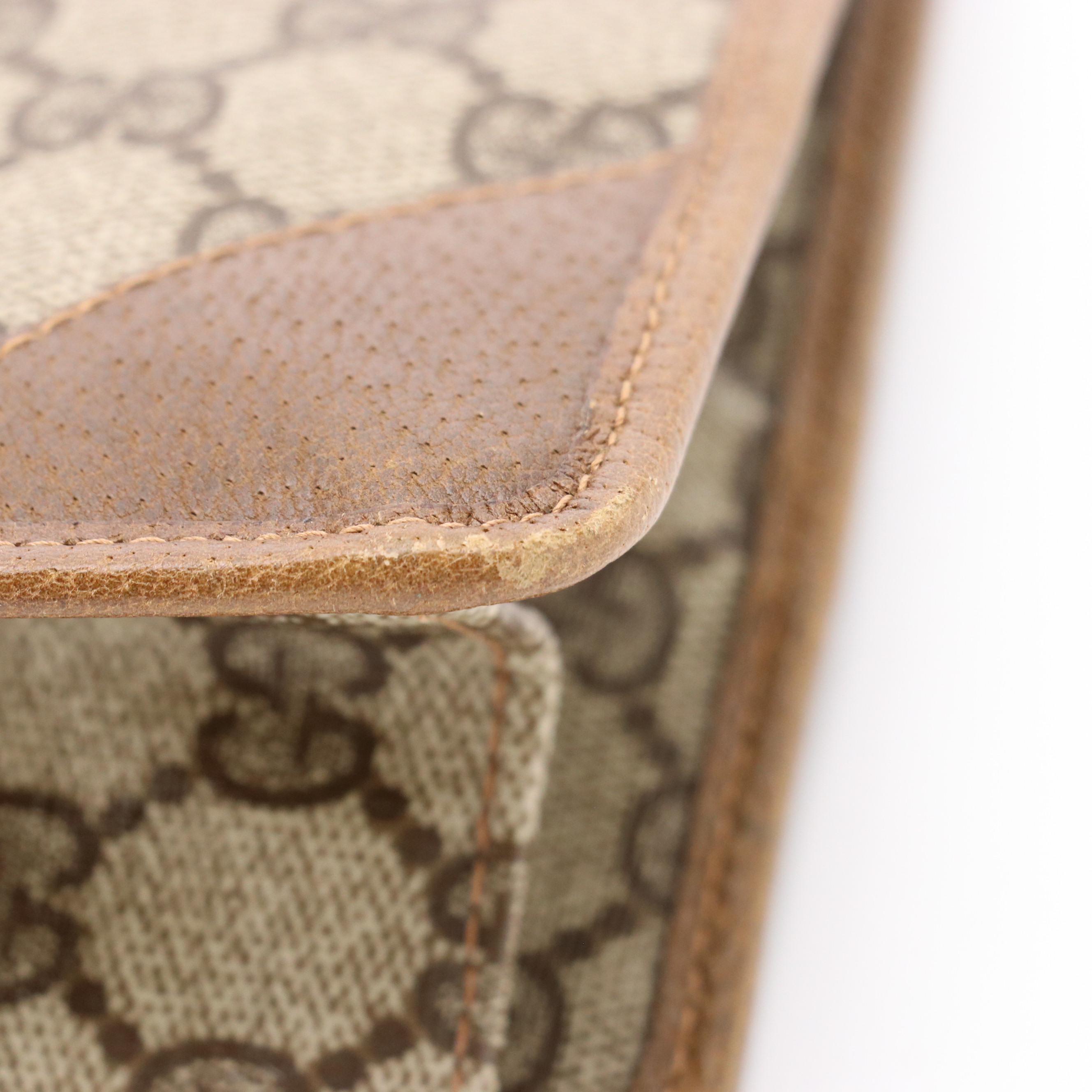 Gucci Accessory Collection Zip Clutch in GG Supreme Canvas and Brown Leather