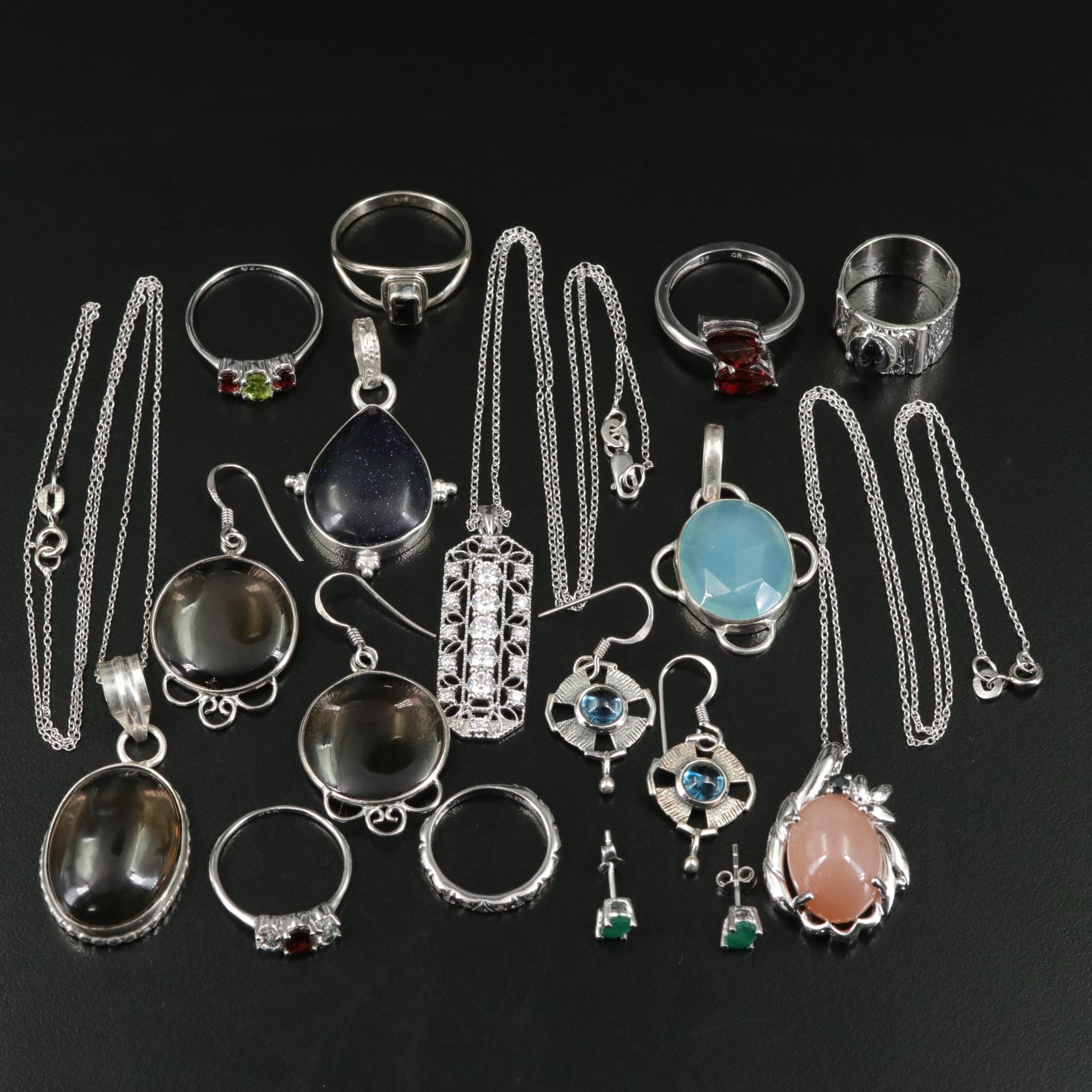 Group of 14 Assorted Sterling Silver Rings, Necklaces, Earrings, and Pendants