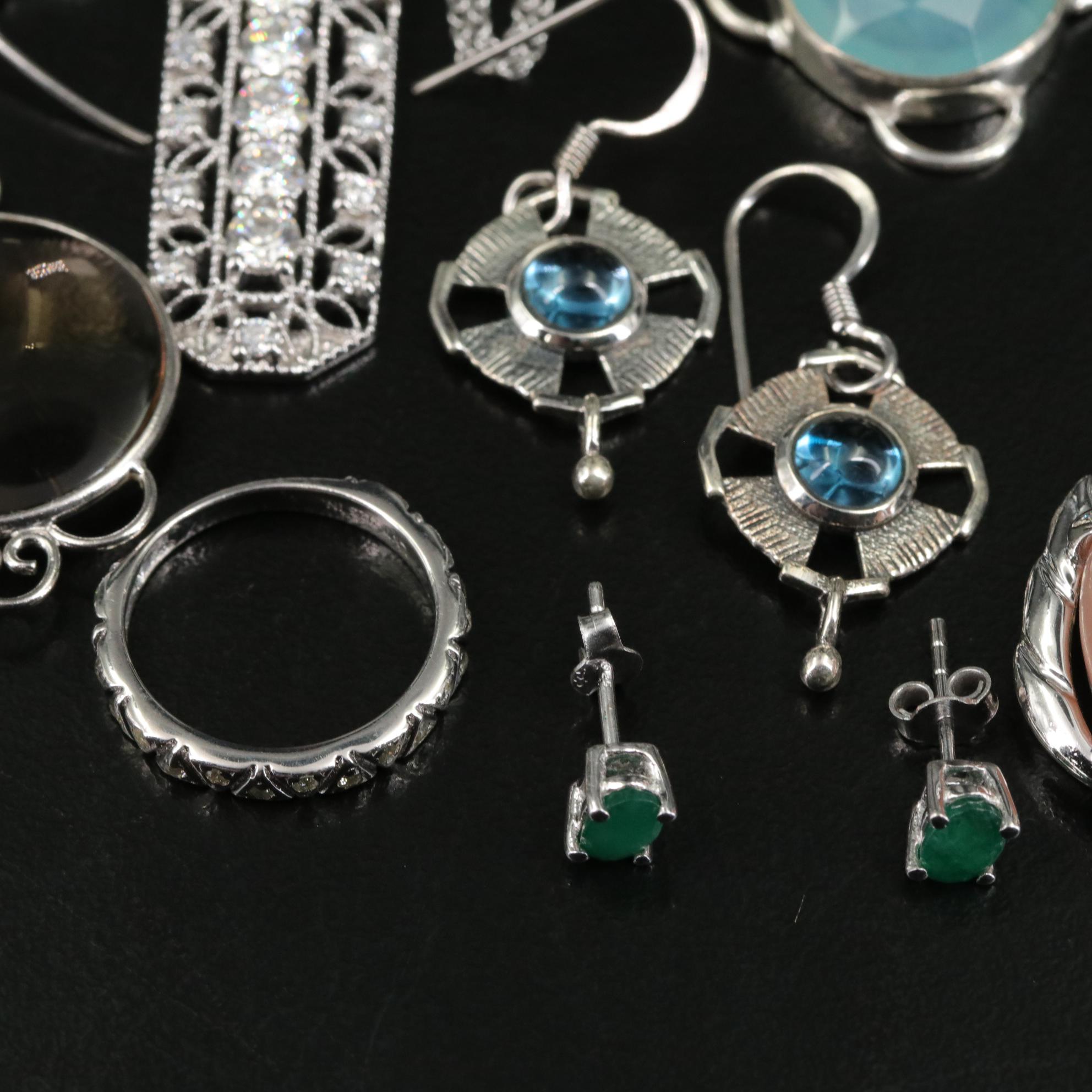 Group of 14 Assorted Sterling Silver Rings, Necklaces, Earrings, and Pendants