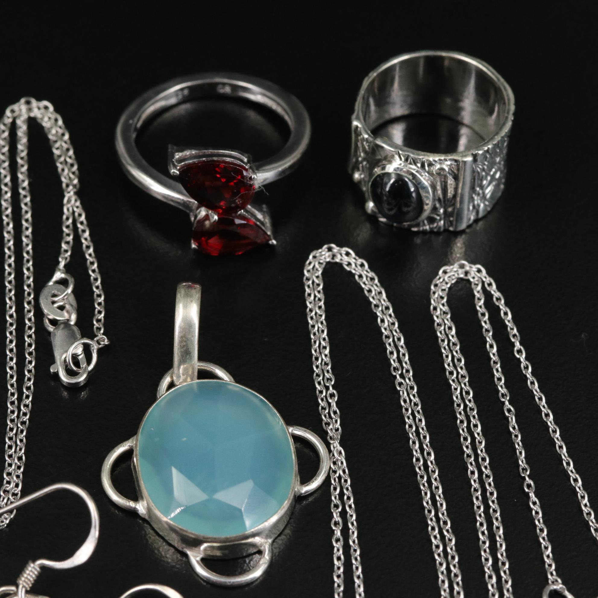 Group of 14 Assorted Sterling Silver Rings, Necklaces, Earrings, and Pendants