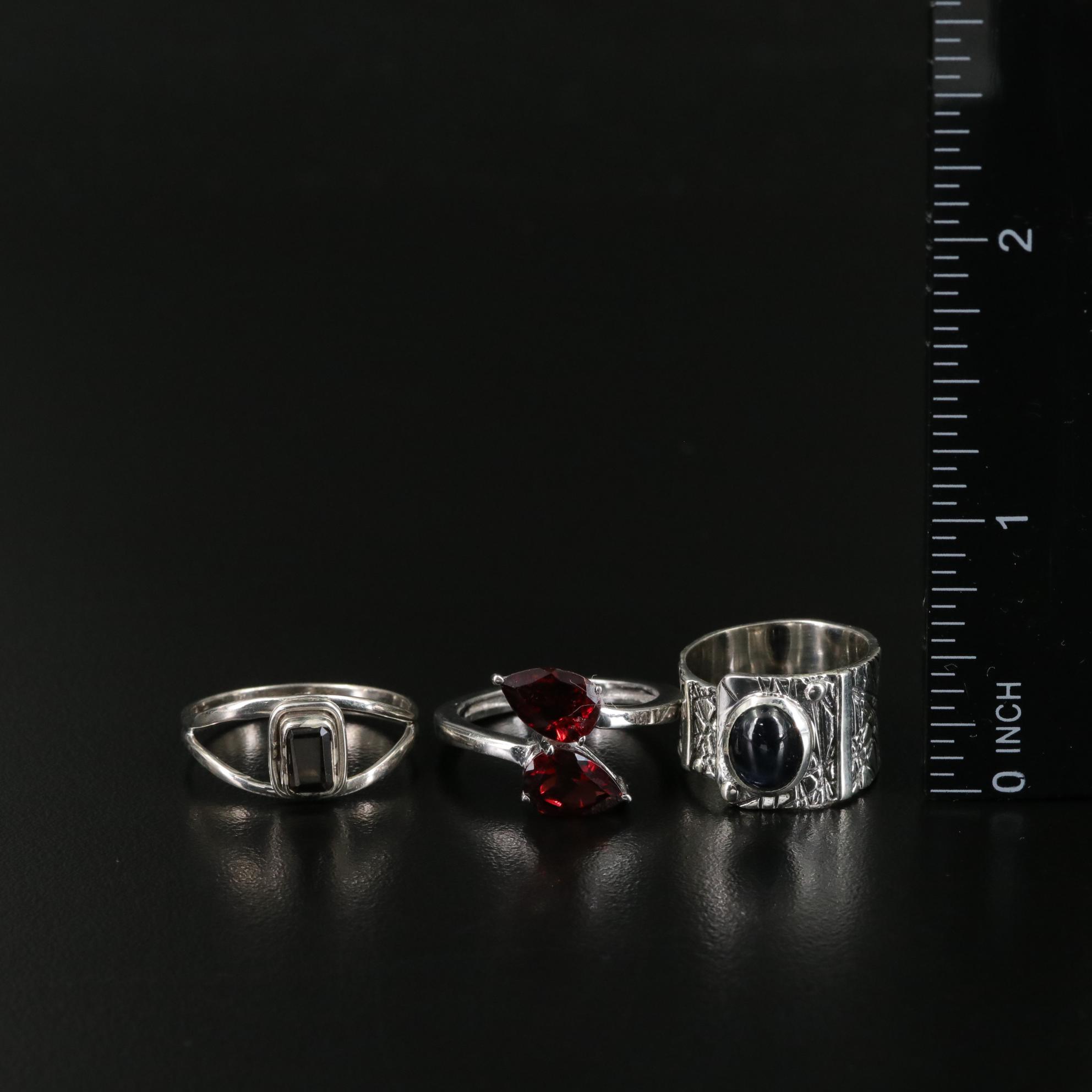 Group of 14 Assorted Sterling Silver Rings, Necklaces, Earrings, and Pendants