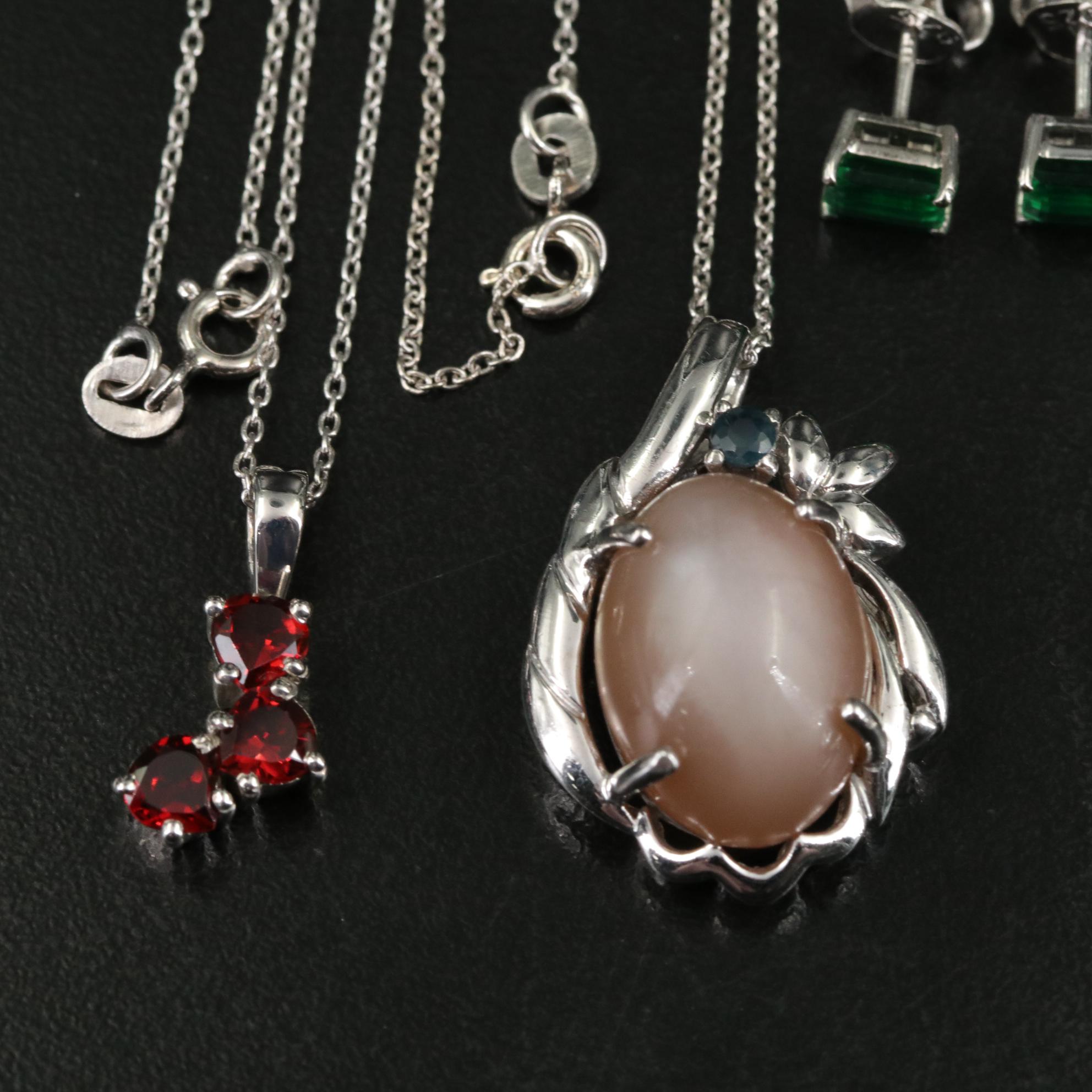 Group of 14 Assorted Sterling Silver Rings, Necklaces, Earrings, and Pendants