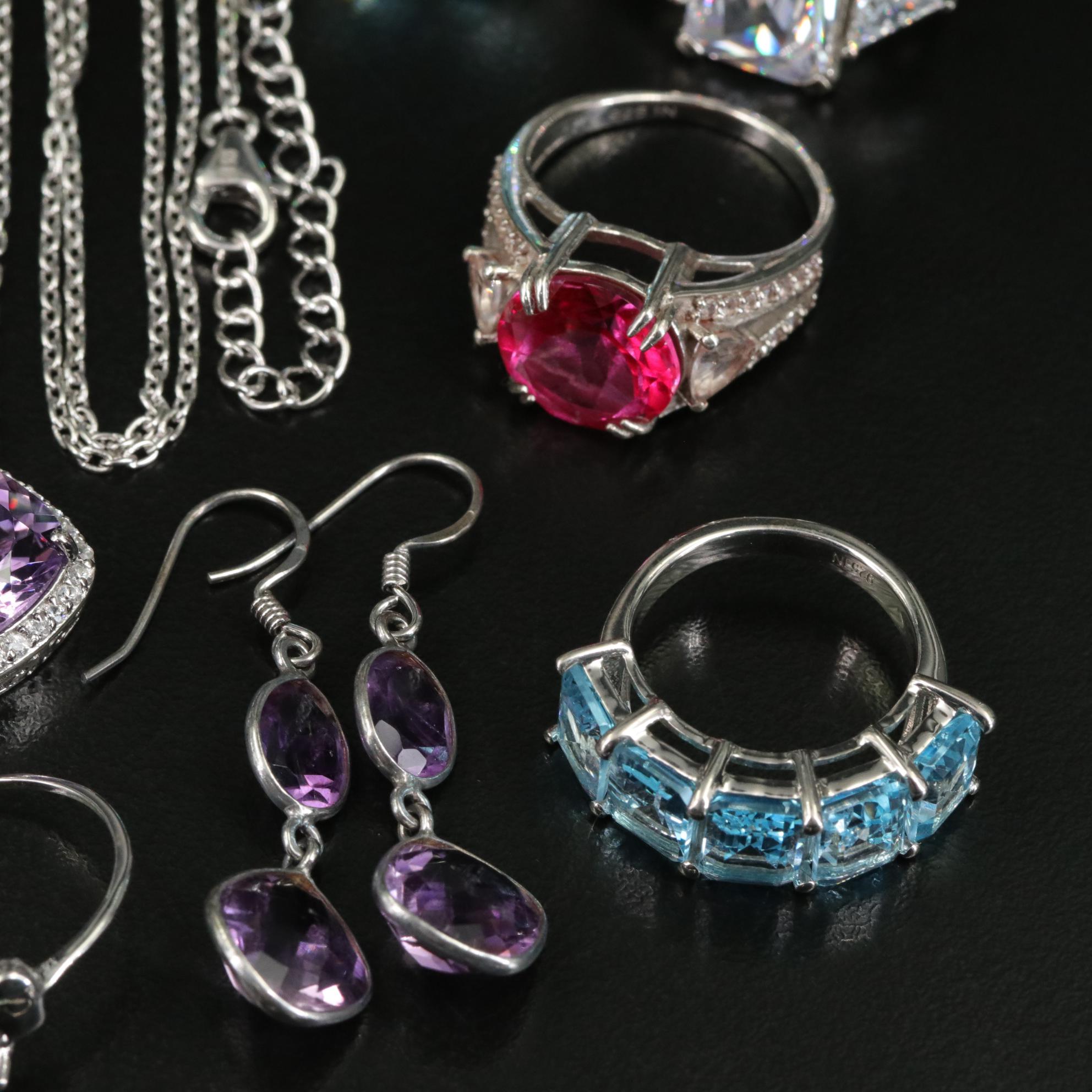 Group of 14 Assorted Sterling Silver Rings, Necklaces, Earrings, and Pendants