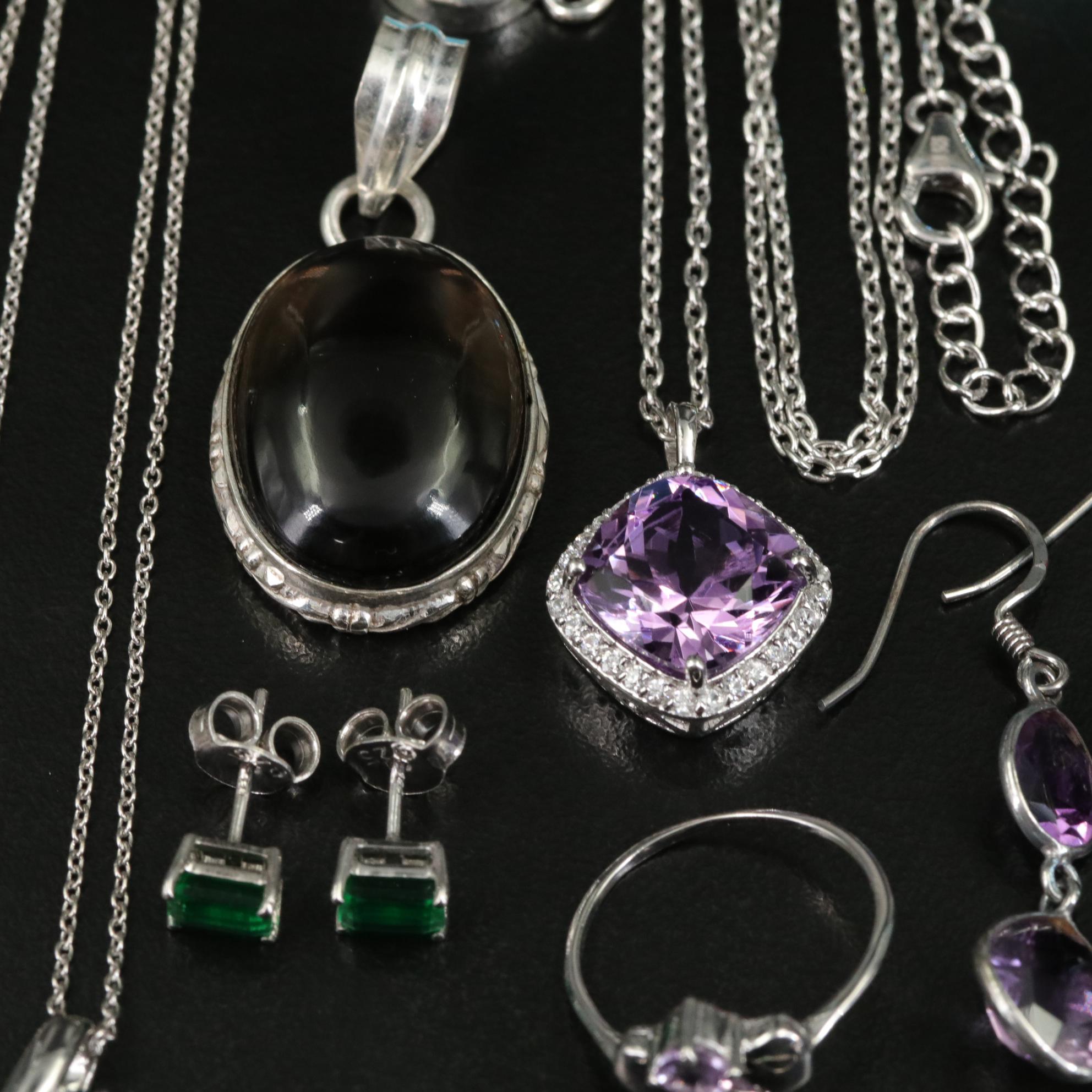 Group of 14 Assorted Sterling Silver Rings, Necklaces, Earrings, and Pendants