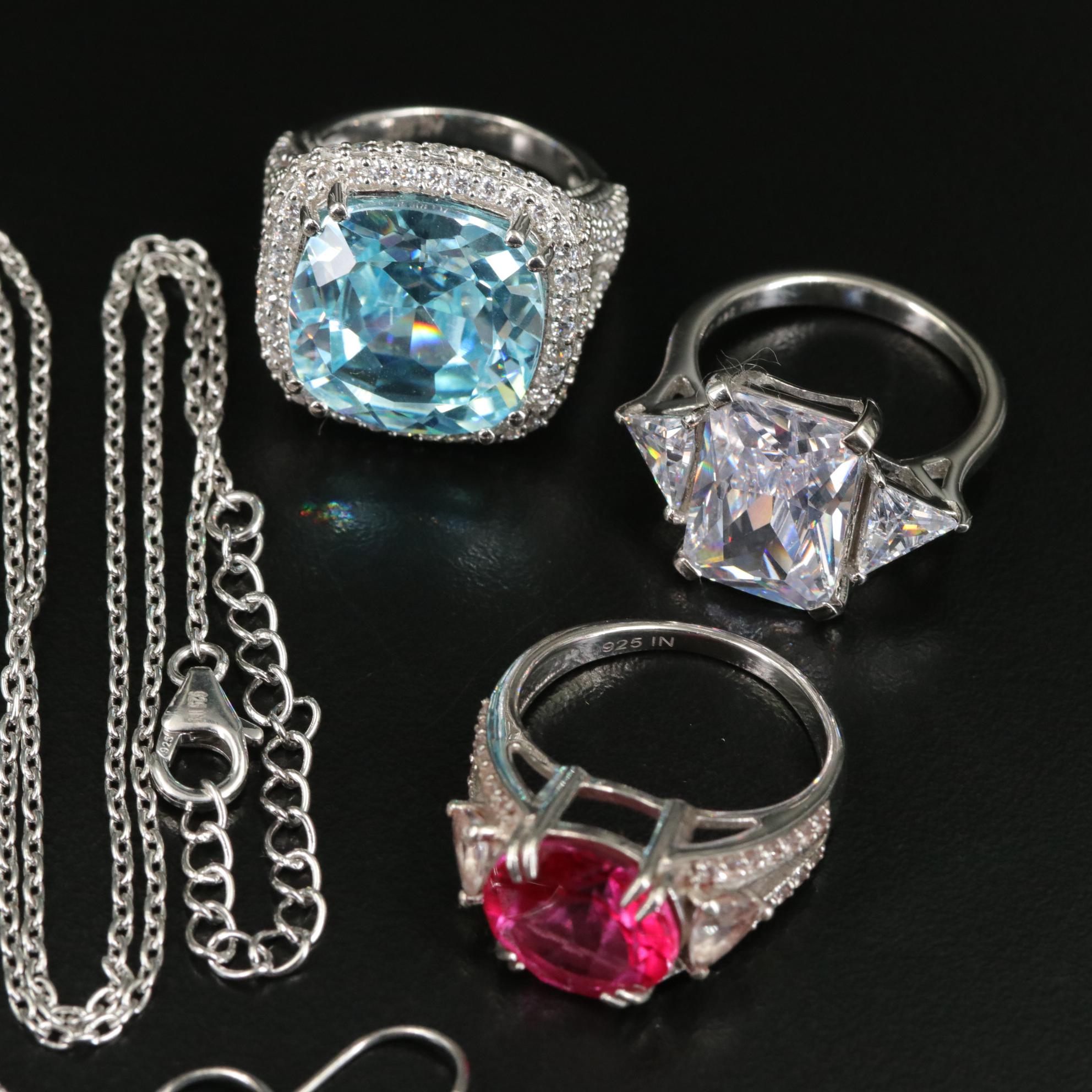 Group of 14 Assorted Sterling Silver Rings, Necklaces, Earrings, and Pendants