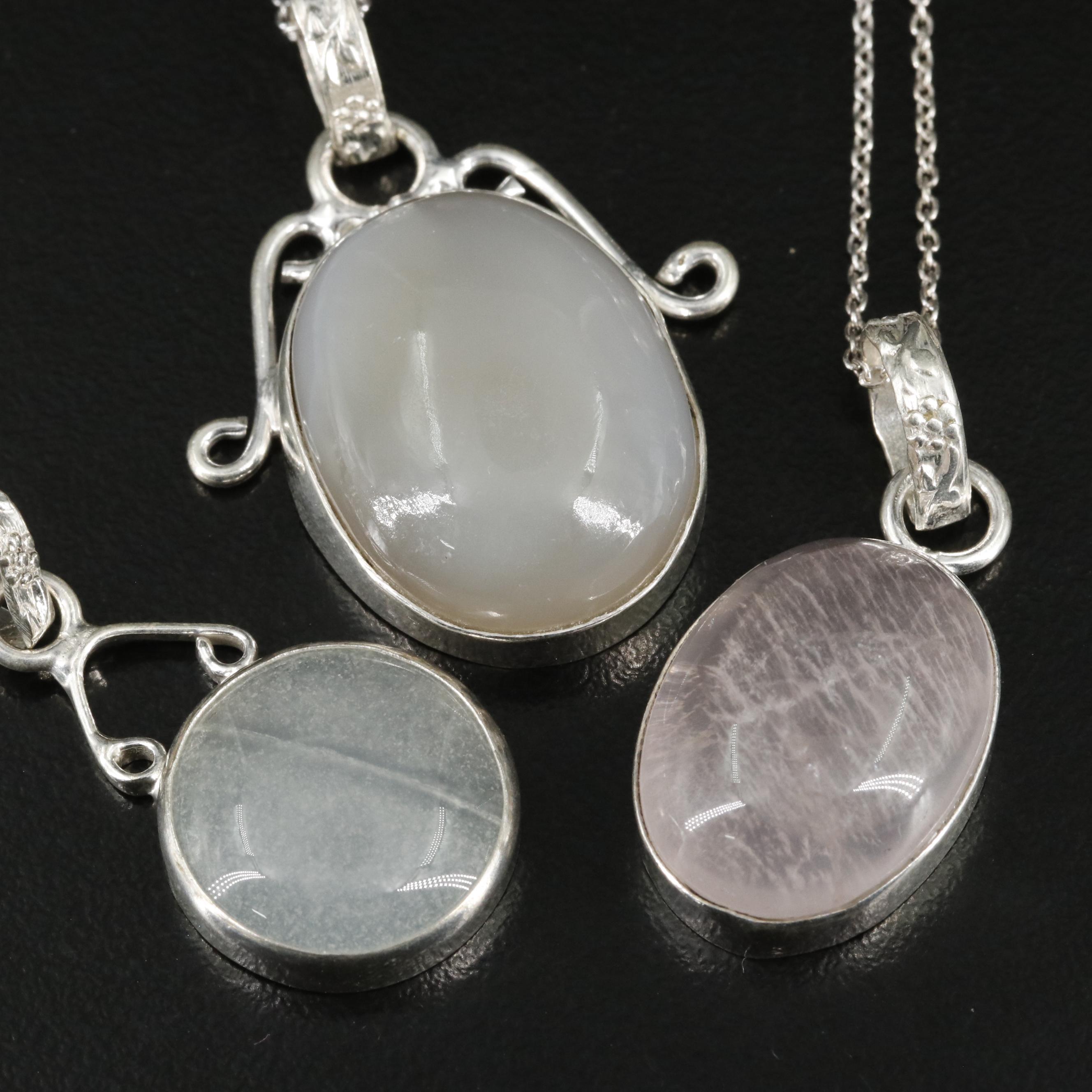 Group of 14 Assorted Sterling Silver Rings, Necklaces, Earrings, and Pendants