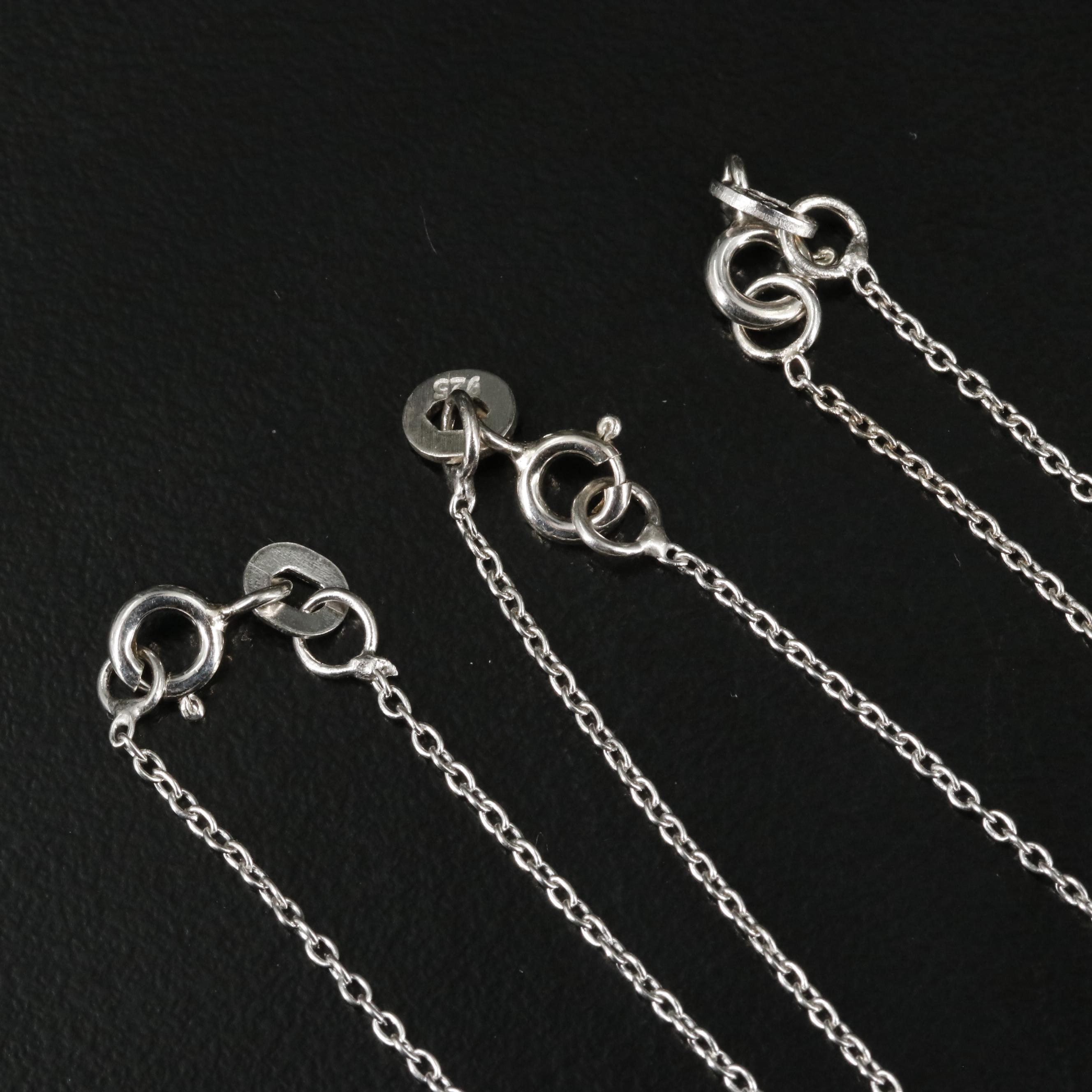 Group of 14 Assorted Sterling Silver Rings, Necklaces, Earrings, and Pendants