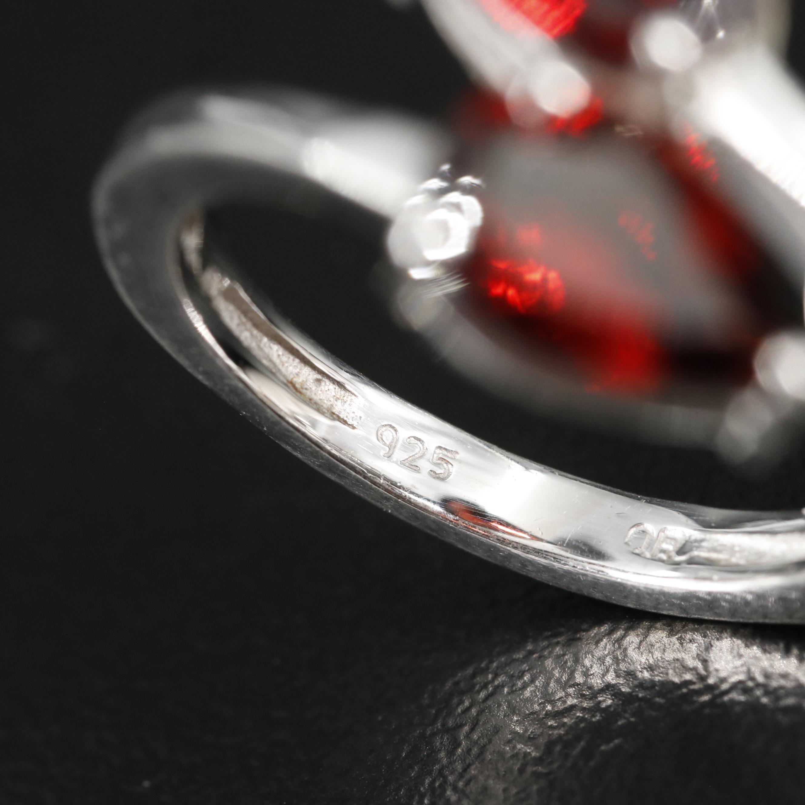 Group of 14 Assorted Sterling Silver Rings, Necklaces, Earrings, and Pendants