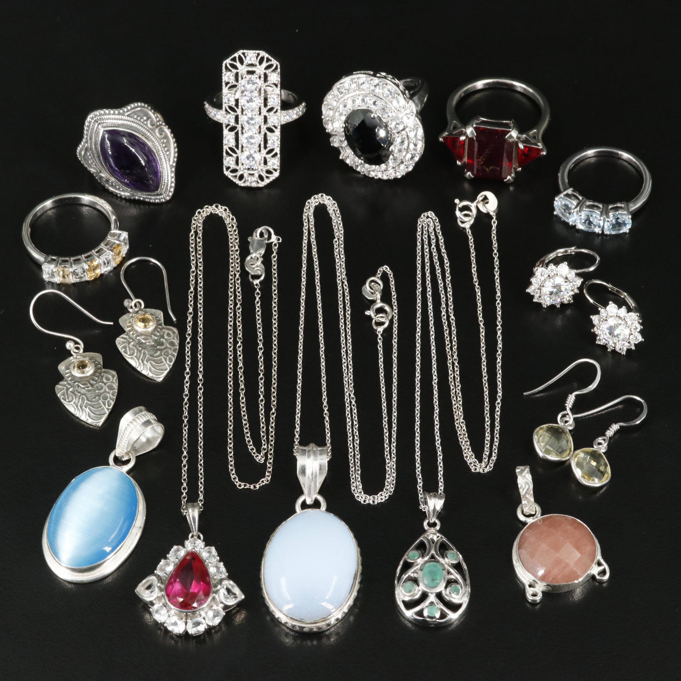 Group of 14 Assorted Sterling Silver Rings, Necklaces, Earrings, and Pendants
