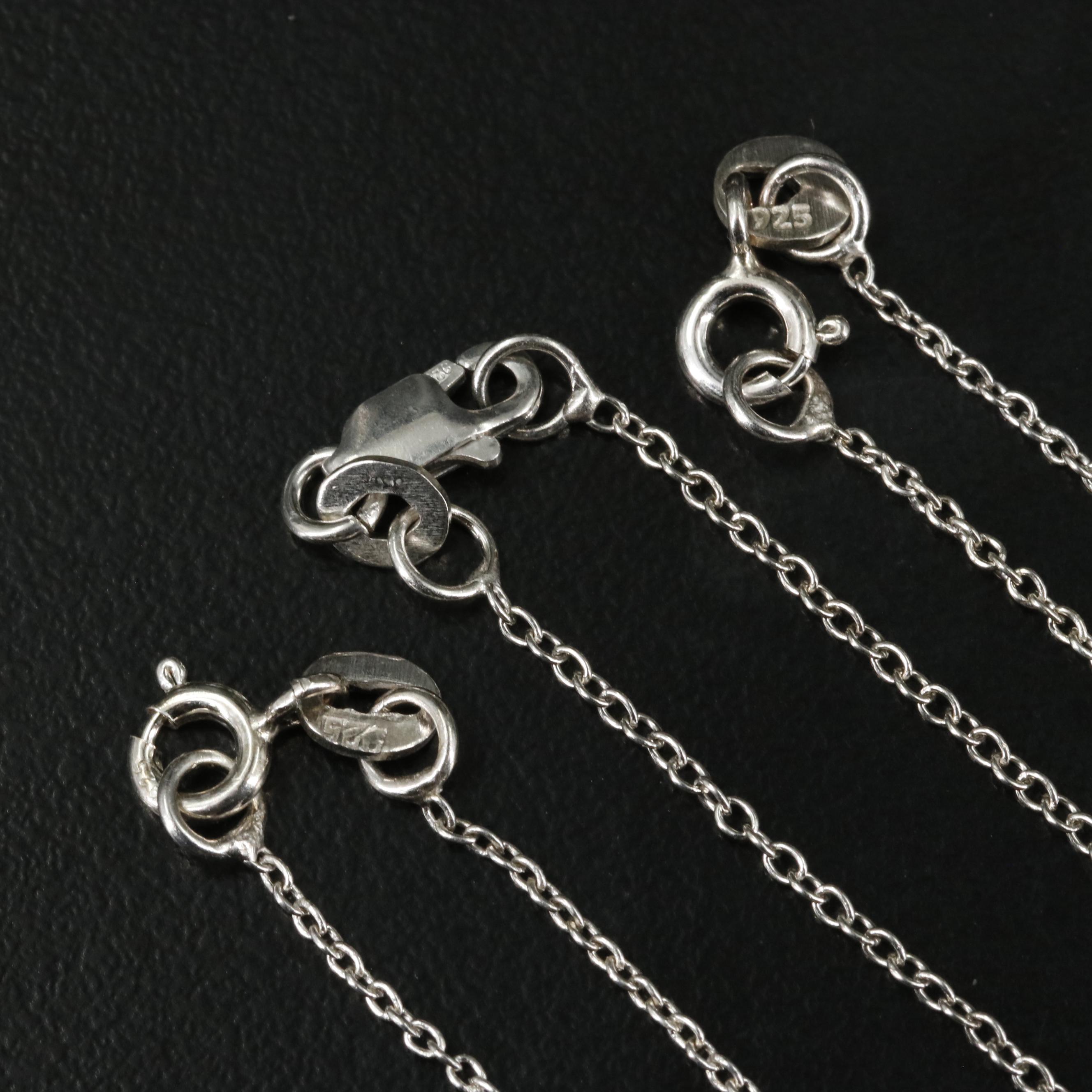 Group of 14 Assorted Sterling Silver Rings, Necklaces, Earrings, and Pendants