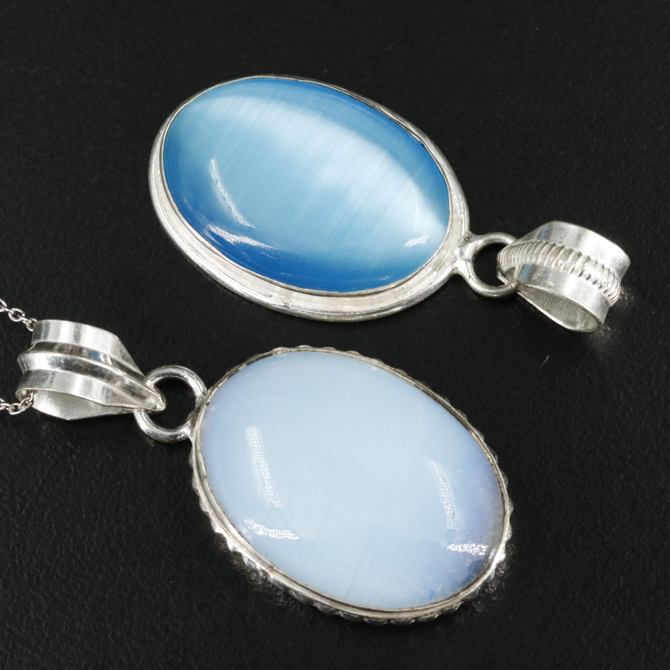 Group of 14 Assorted Sterling Silver Rings, Necklaces, Earrings, and Pendants