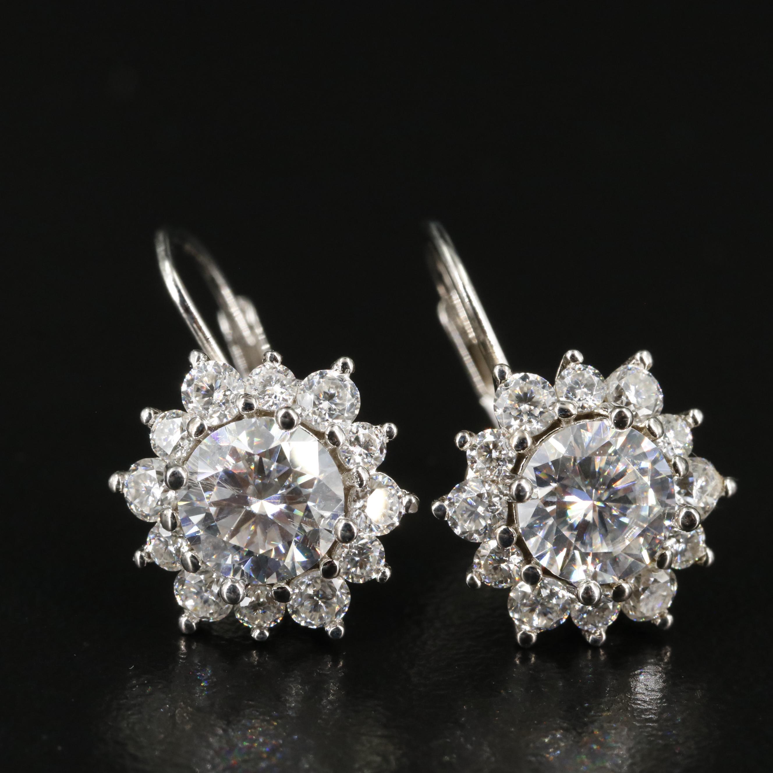 Group of 14 Assorted Sterling Silver Rings, Necklaces, Earrings, and Pendants