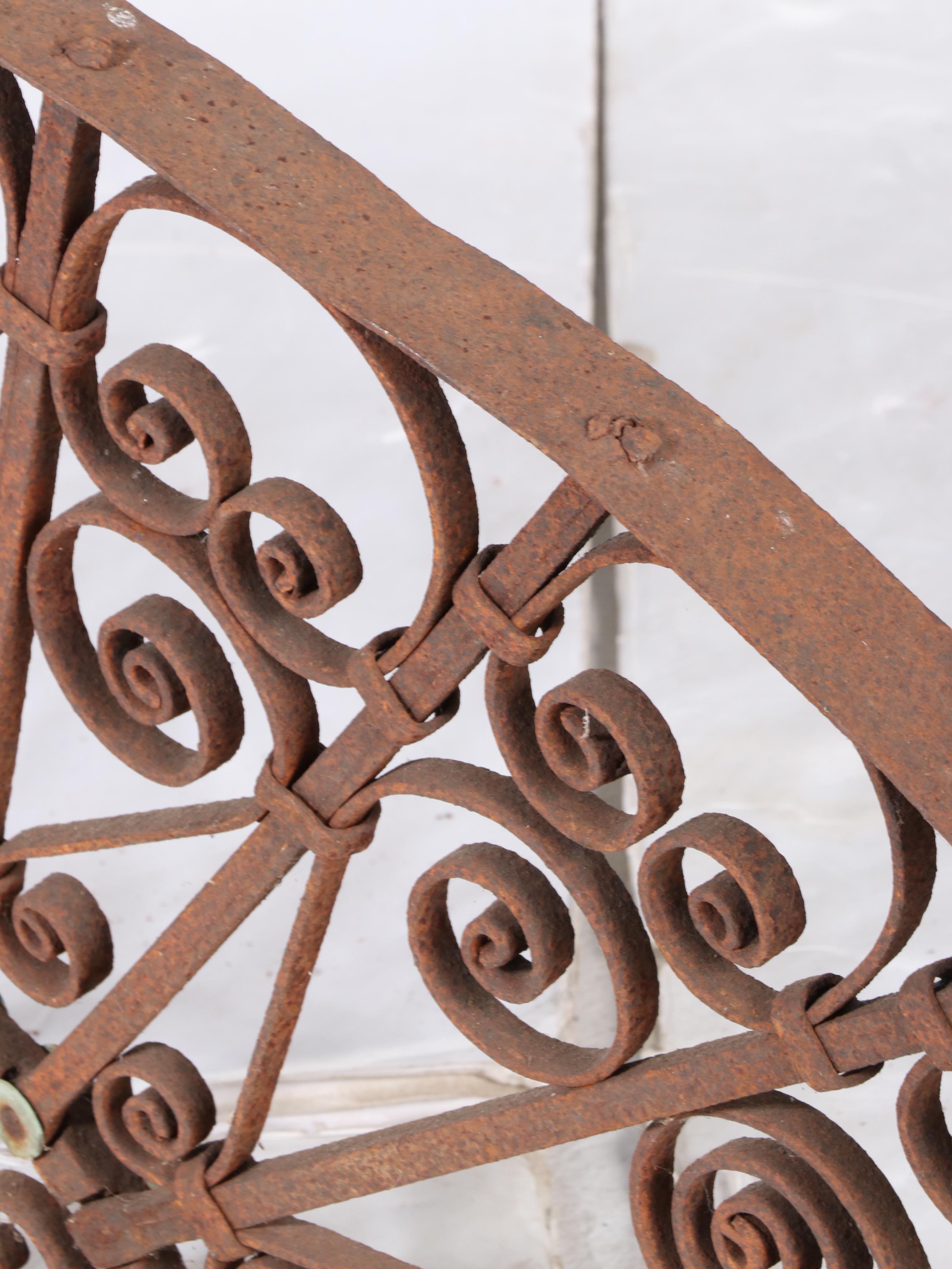 Two Late Victorian Wrought Iron Transom Window Screens