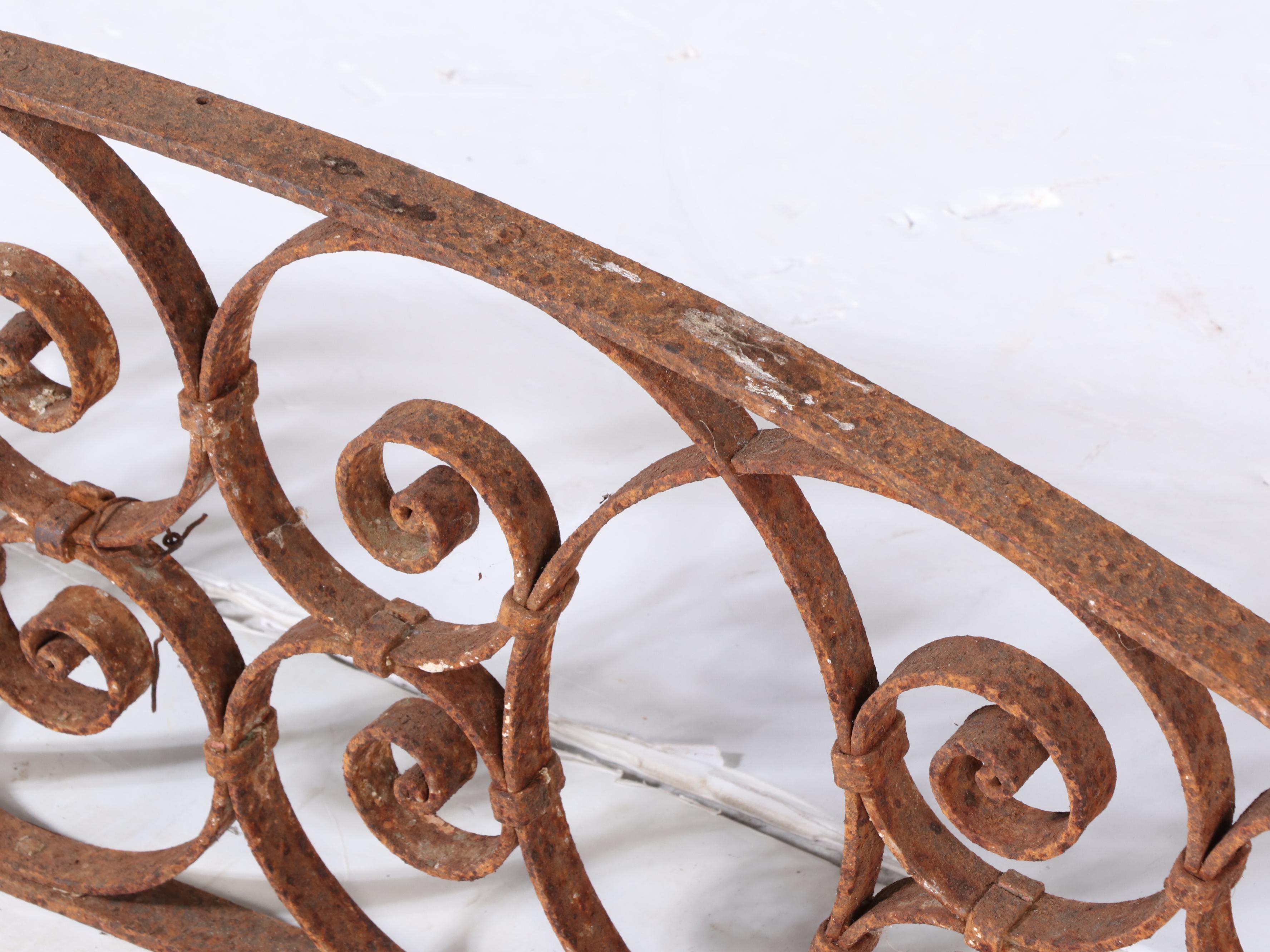 Two Late Victorian Wrought Iron Transom Window Screens