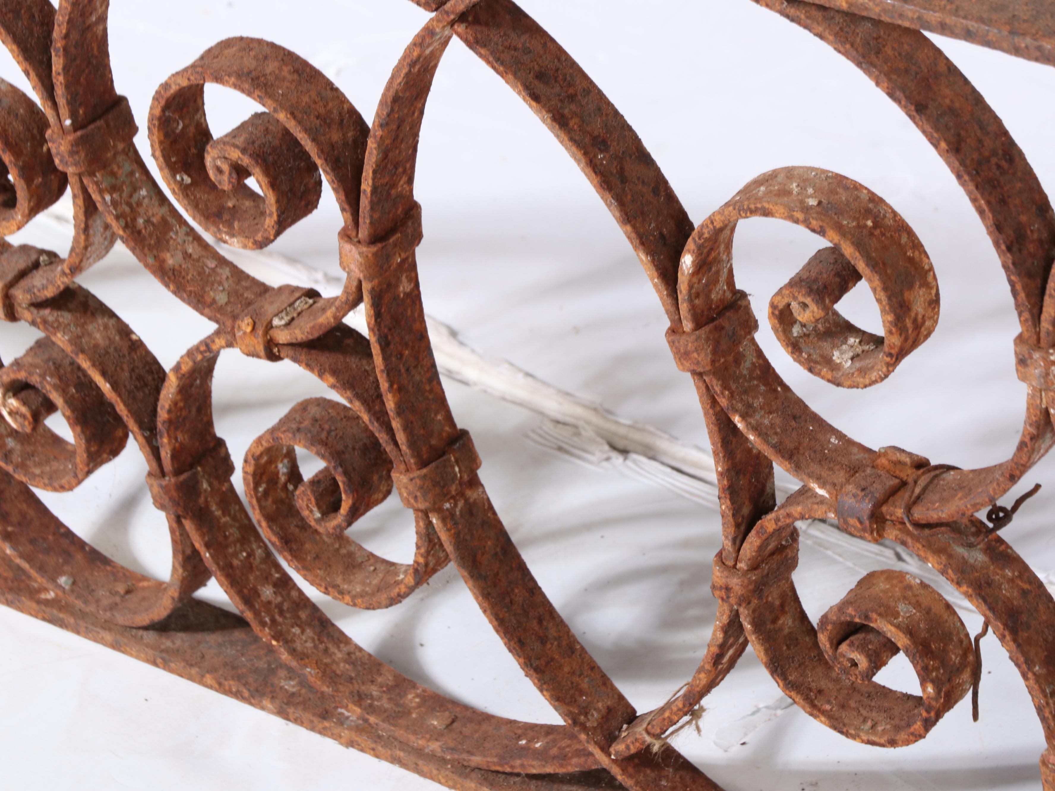 Two Late Victorian Wrought Iron Transom Window Screens