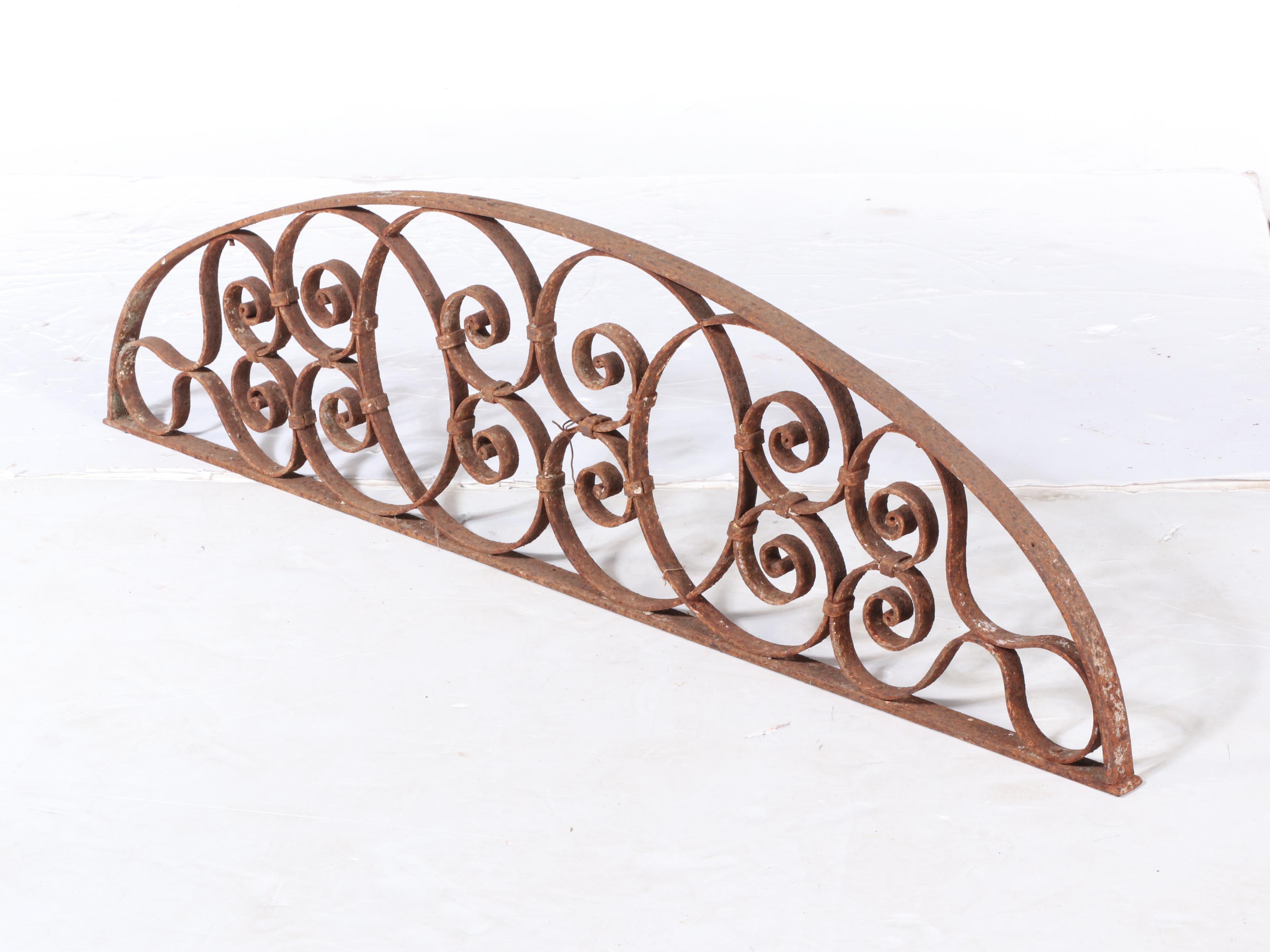 Two Late Victorian Wrought Iron Transom Window Screens