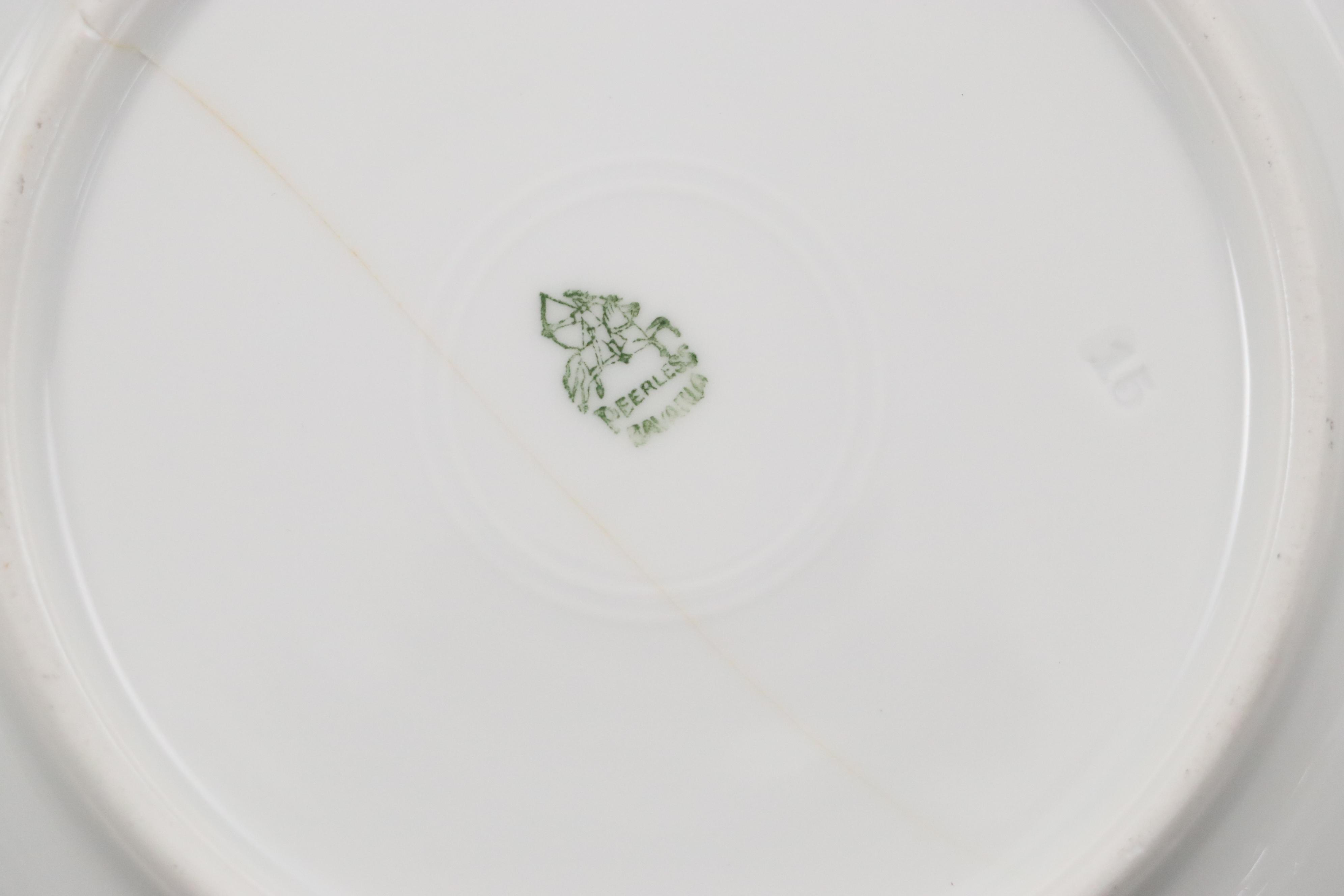 Peerless Bavarian Porcelain Bread & Butter Plates, Teacups, and Saucers, 20th C.