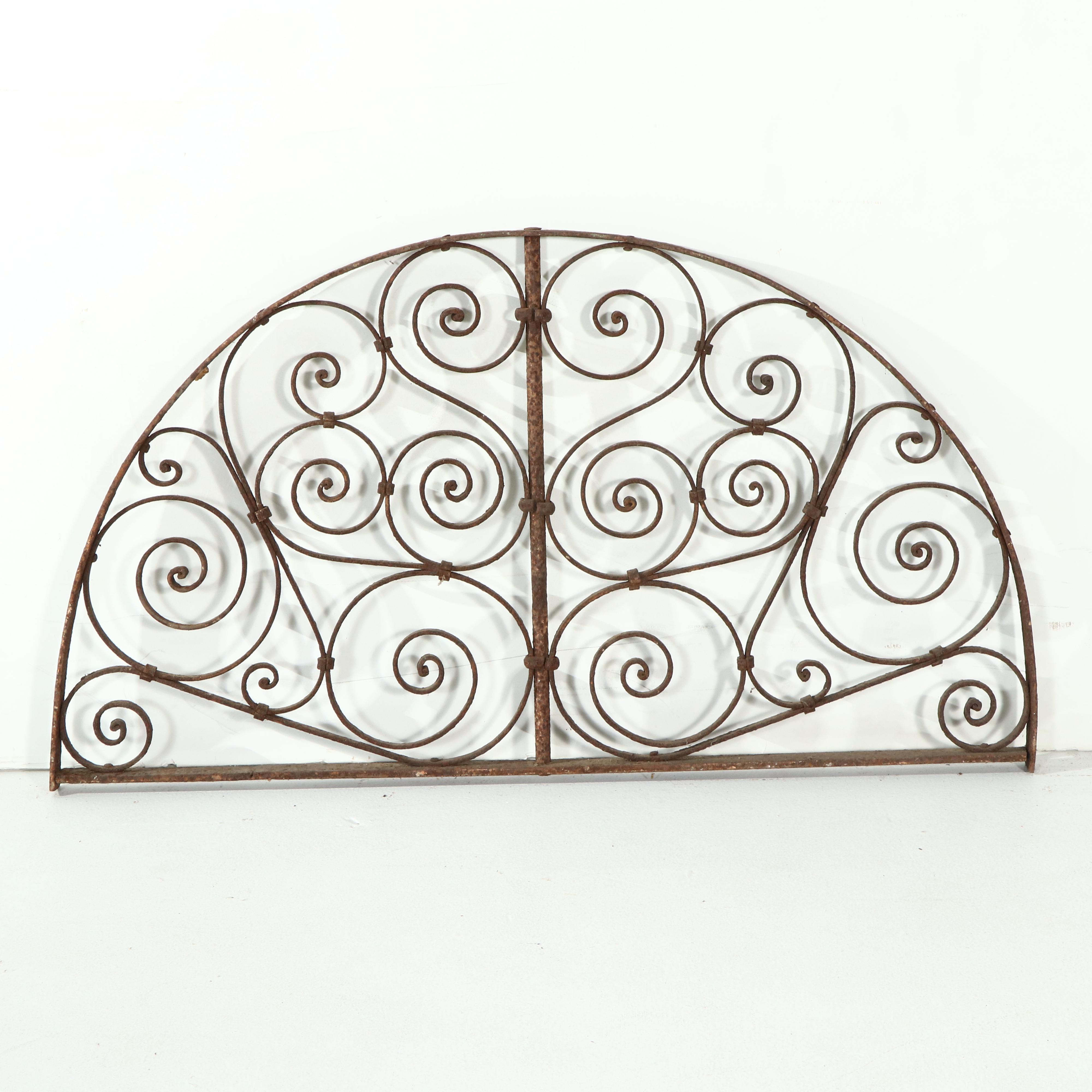 Two Late Victorian Hand-Forged Wrought Iron Transom or Arch Grills