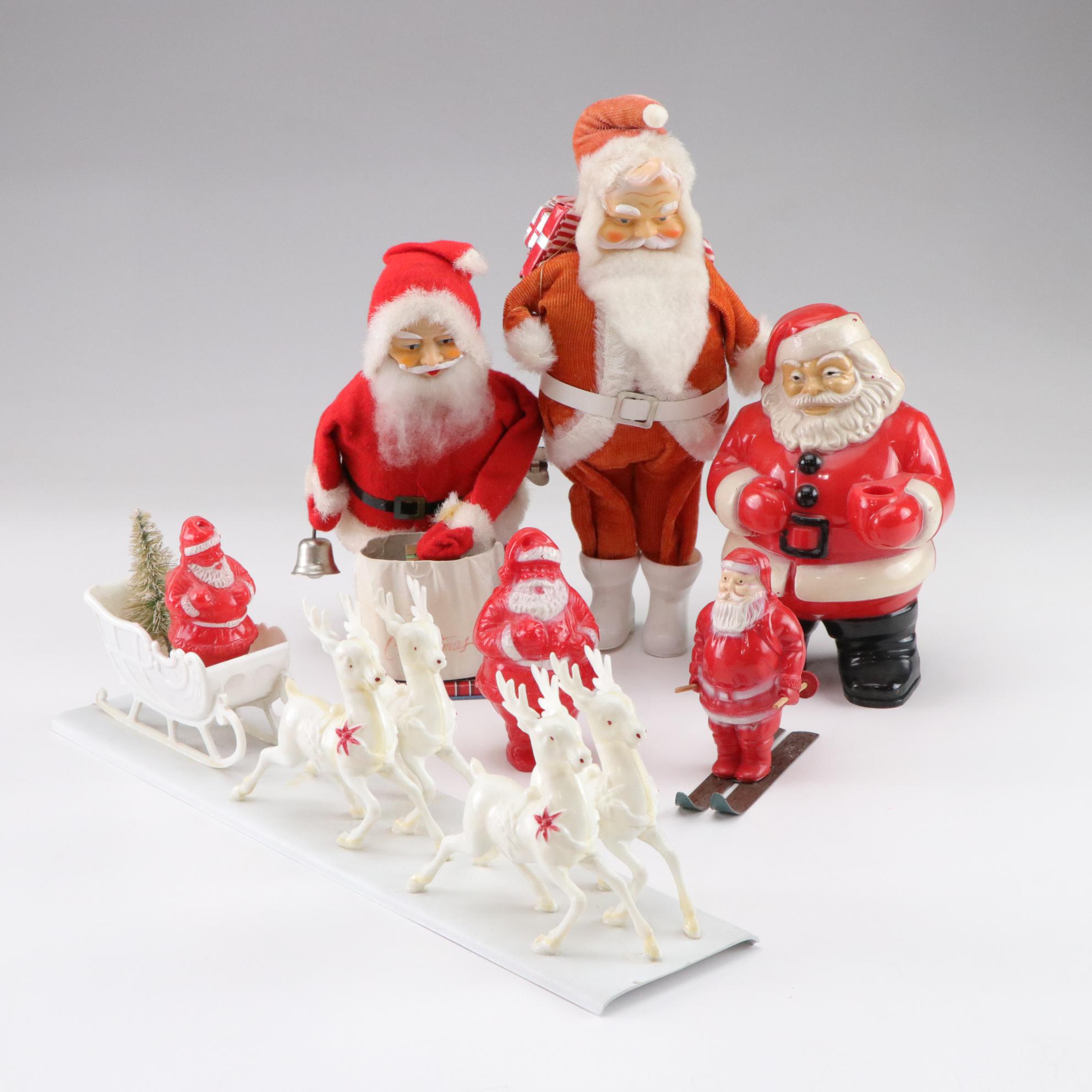 Tin Litho Mechanical and Plastic Santa Figurines, Mid to Late 20th Century