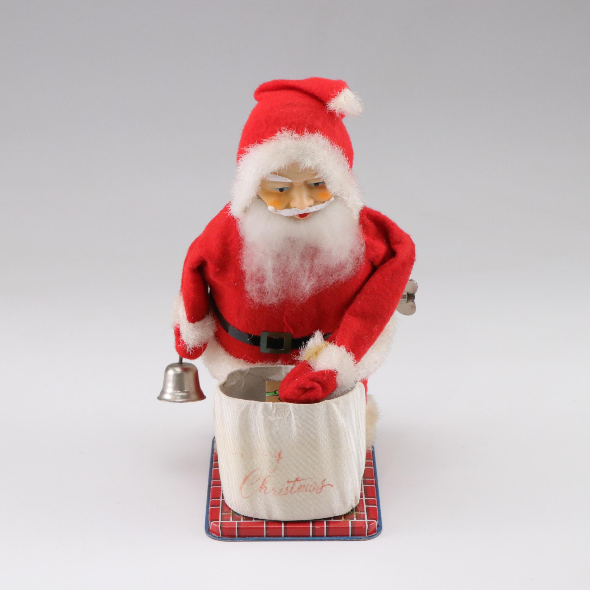 Tin Litho Mechanical and Plastic Santa Figurines, Mid to Late 20th Century