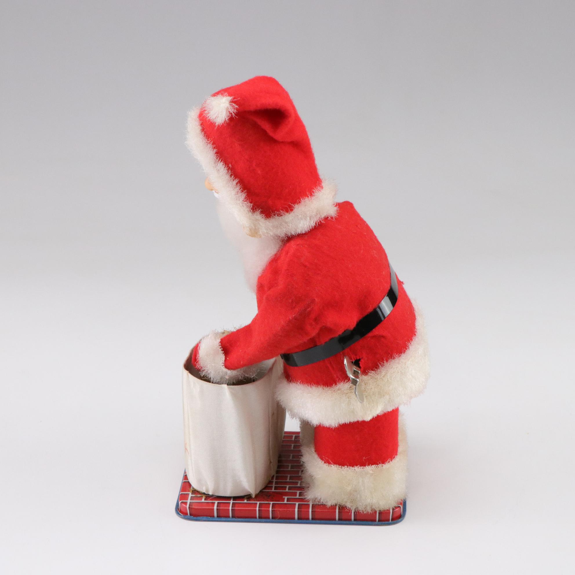Tin Litho Mechanical and Plastic Santa Figurines, Mid to Late 20th Century