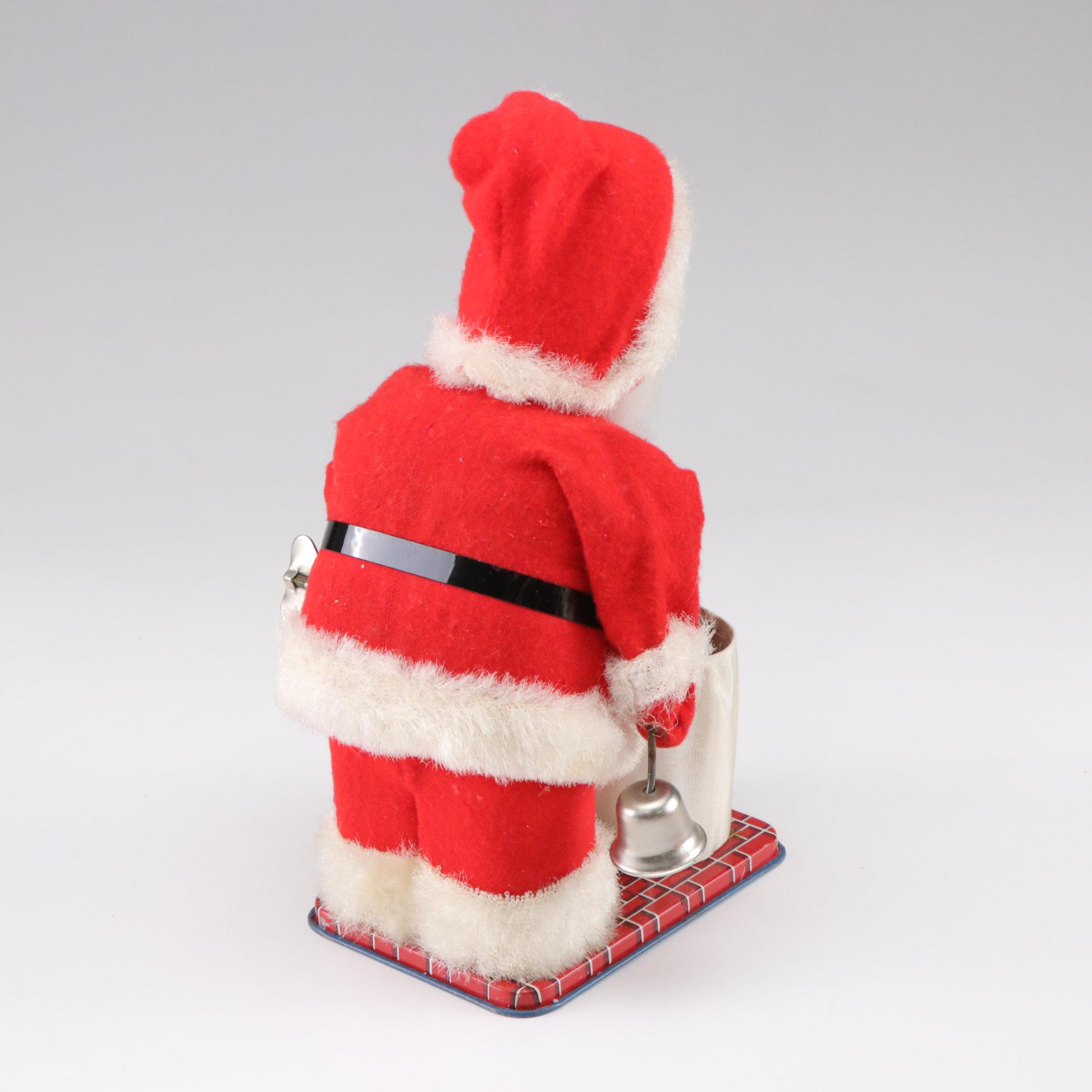 Tin Litho Mechanical and Plastic Santa Figurines, Mid to Late 20th Century