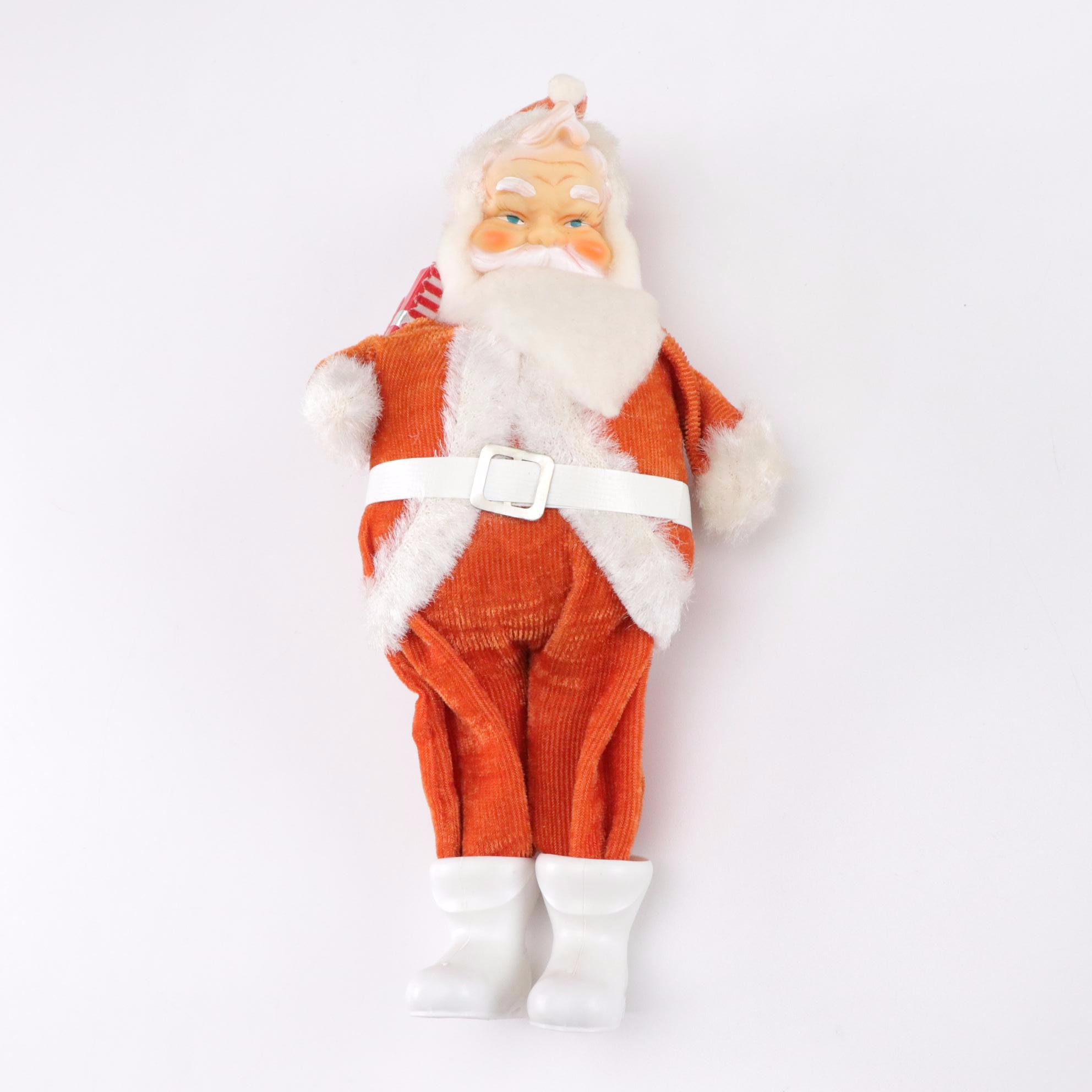 Tin Litho Mechanical and Plastic Santa Figurines, Mid to Late 20th Century