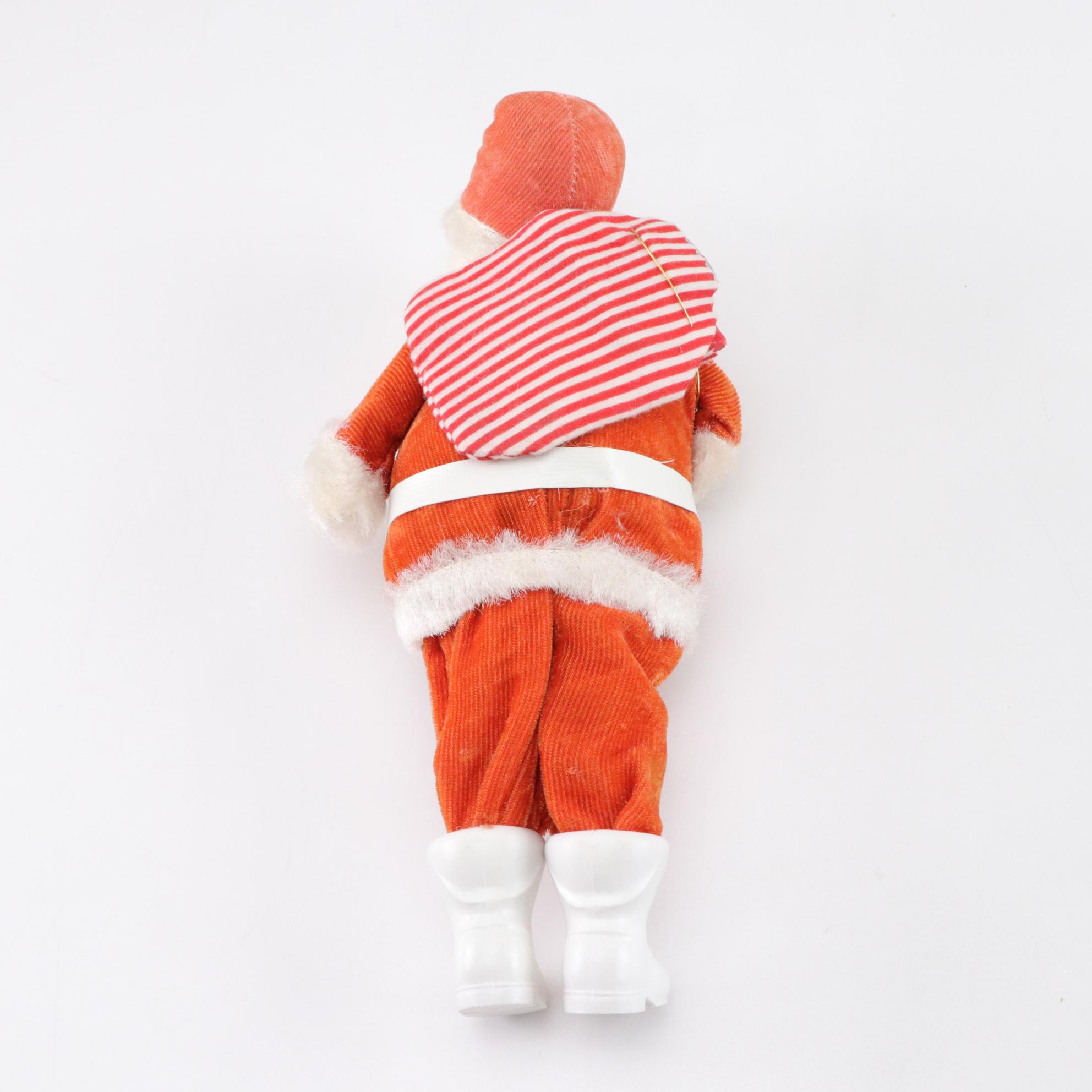 Tin Litho Mechanical and Plastic Santa Figurines, Mid to Late 20th Century