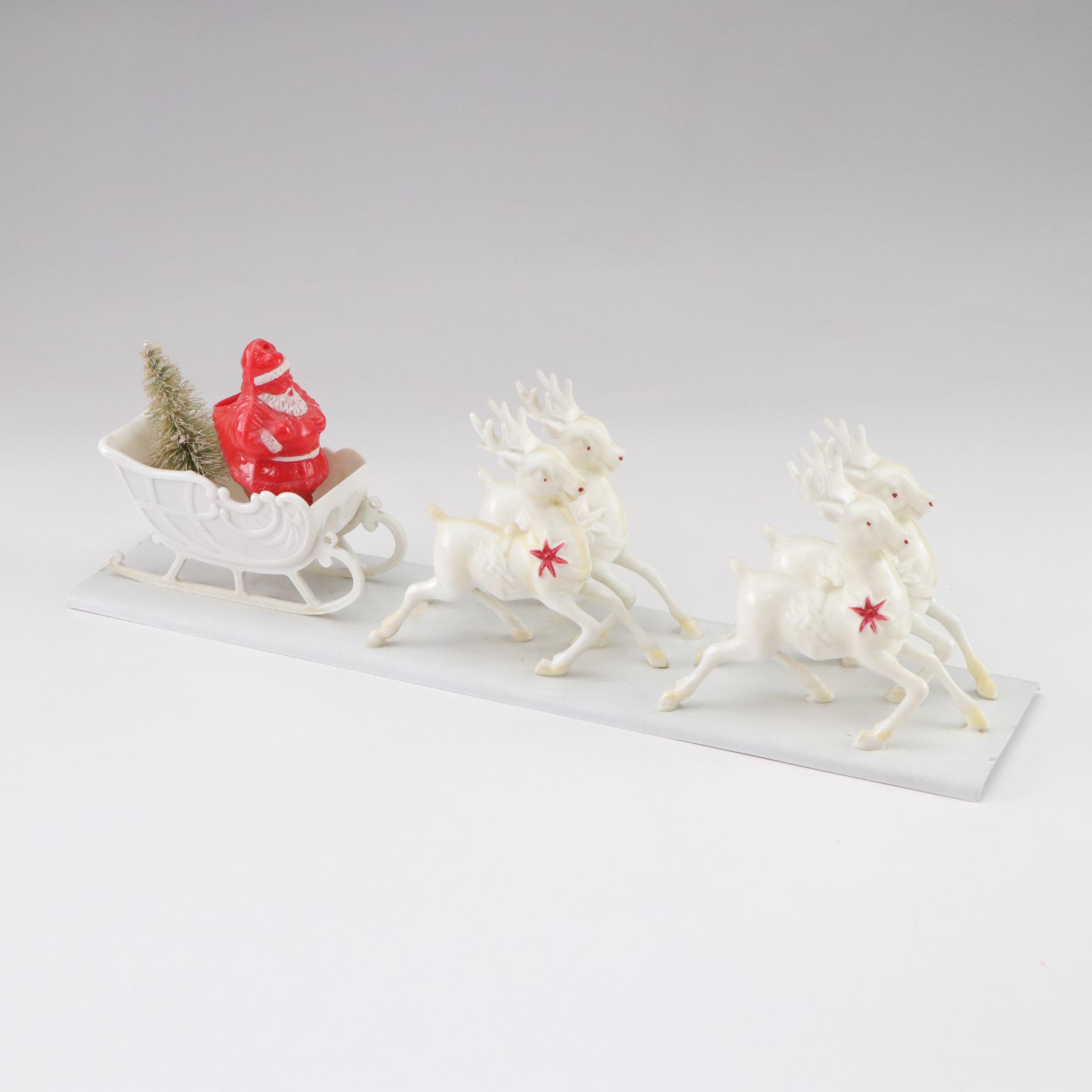 Tin Litho Mechanical and Plastic Santa Figurines, Mid to Late 20th Century