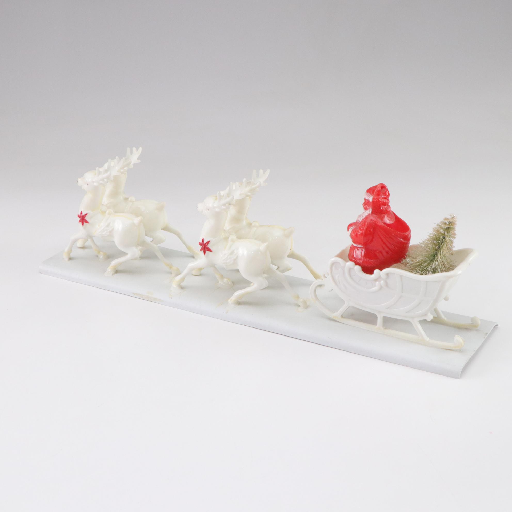 Tin Litho Mechanical and Plastic Santa Figurines, Mid to Late 20th Century