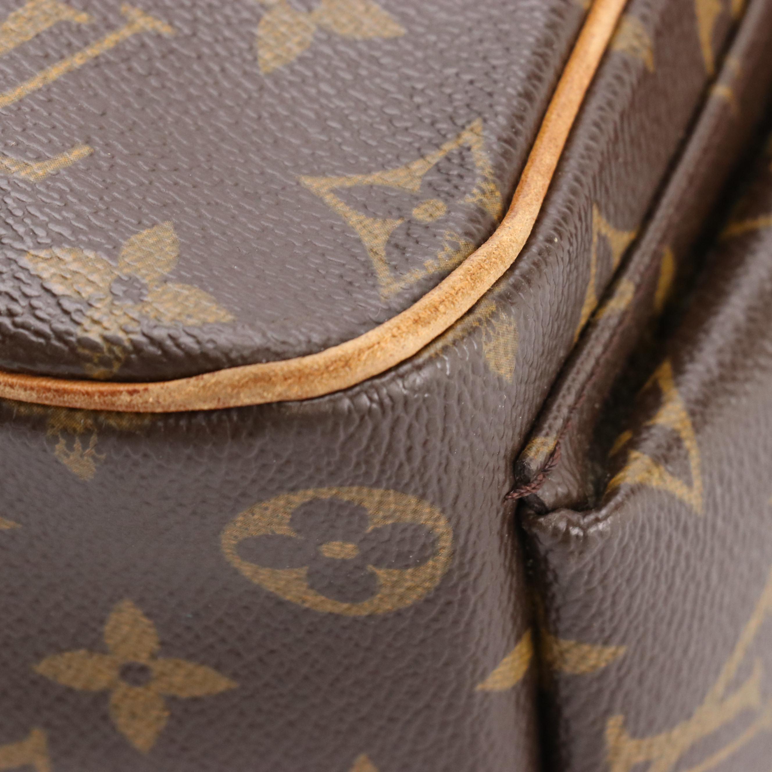 Louis Vuitton Excentri Cité Handbag in Monogram Canvas and Vachetta Leather