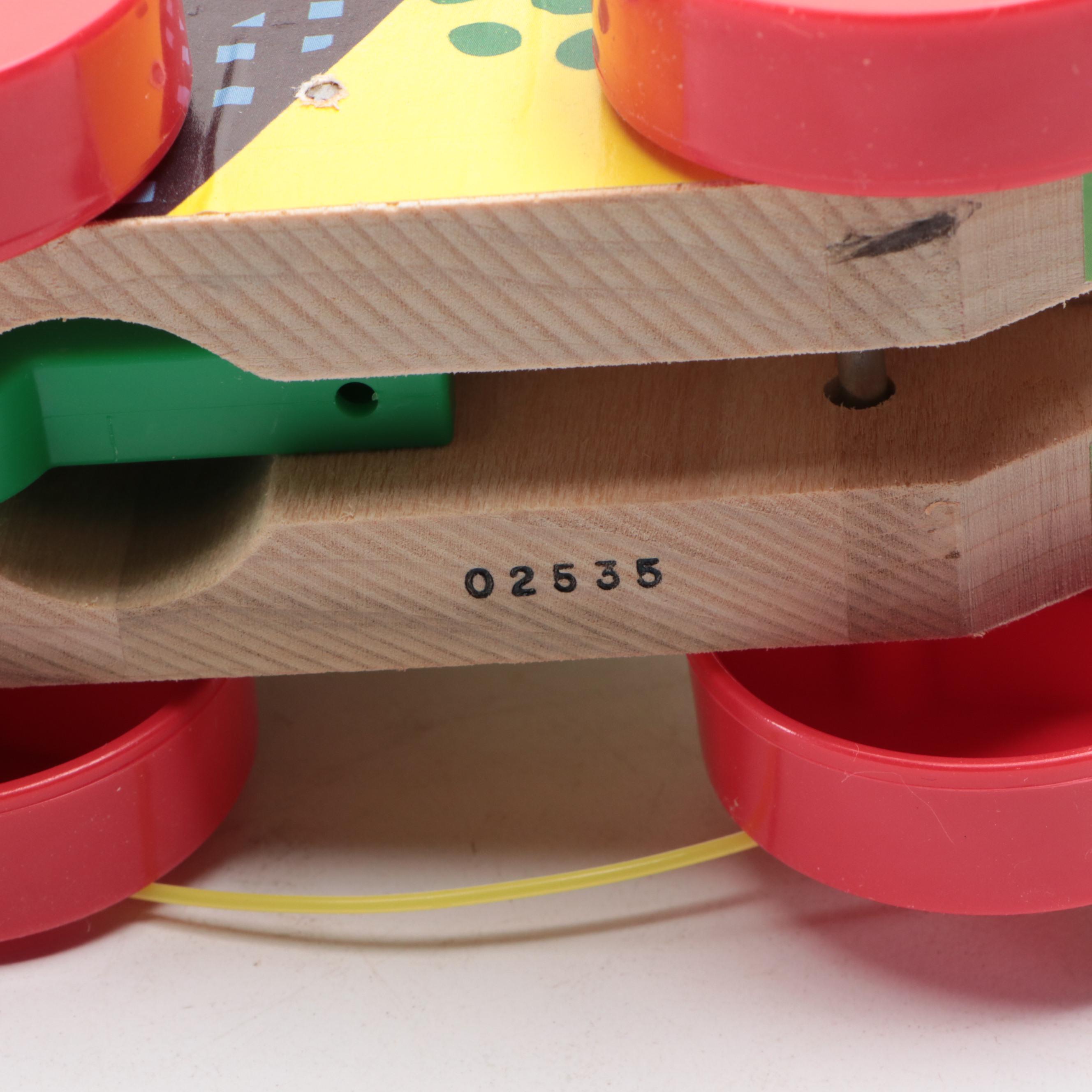 Fisher-Price "Jingle Elephant," "Squeaky the Clown" and More Wooden Toys