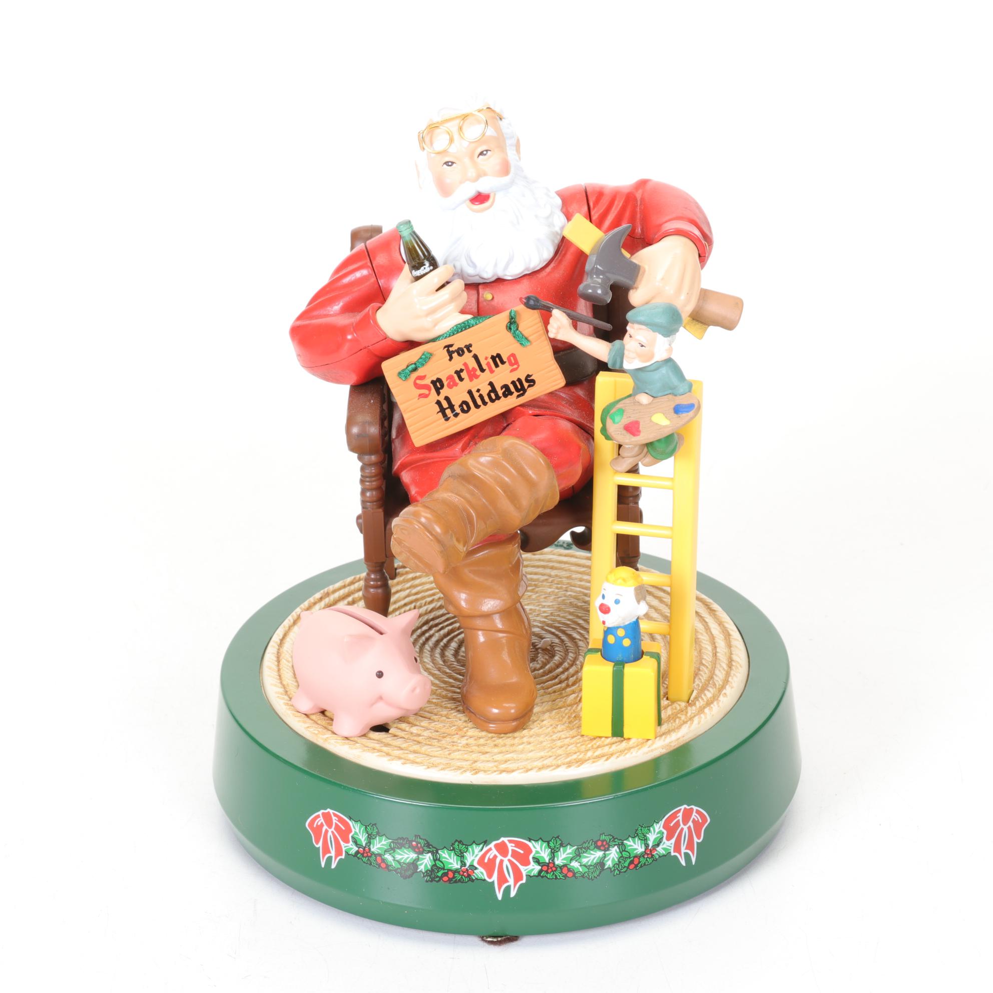 Coca-Cola Christmas Decorations with Three Banks, a Figurine, and a Bobblehead