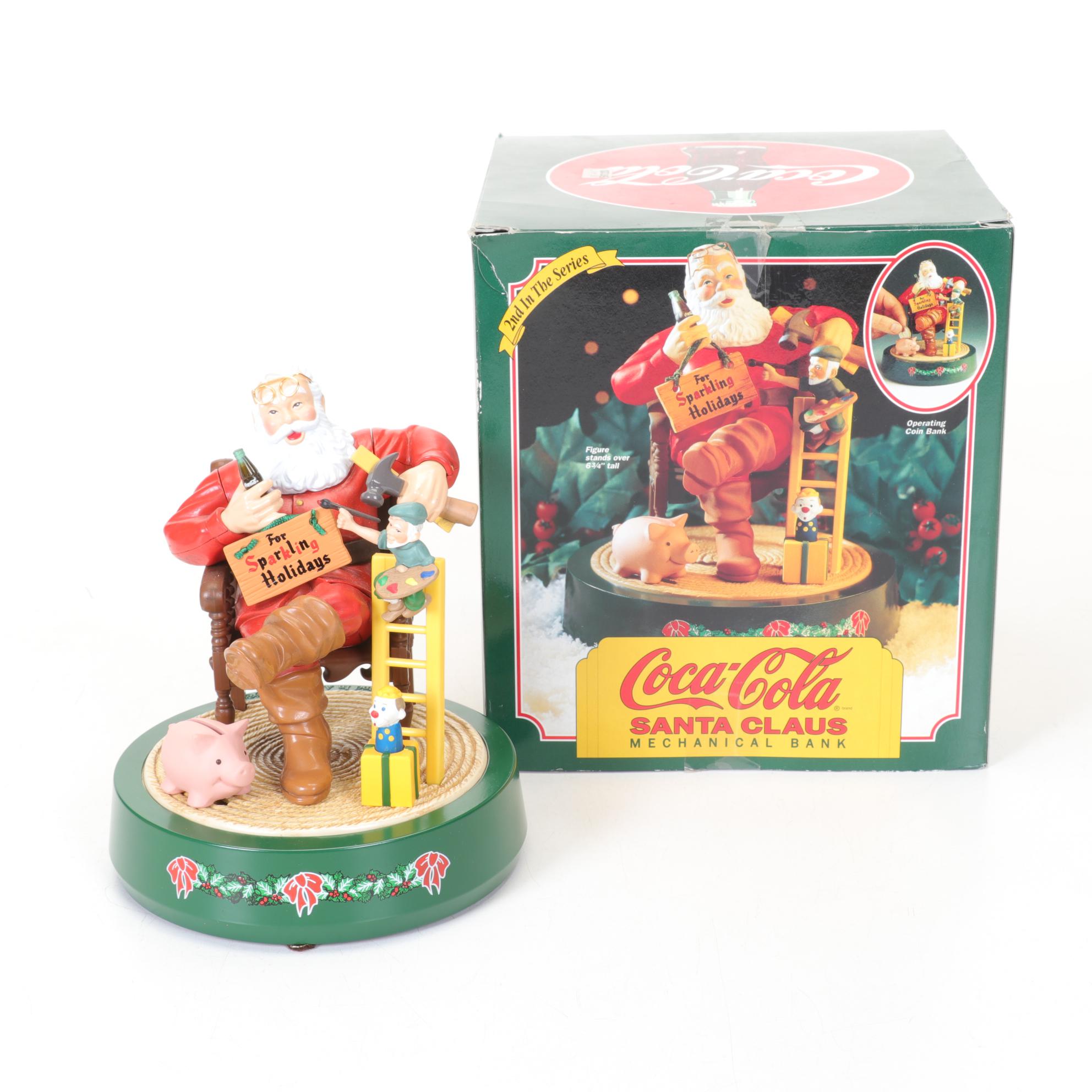 Coca-Cola Christmas Decorations with Three Banks, a Figurine, and a Bobblehead