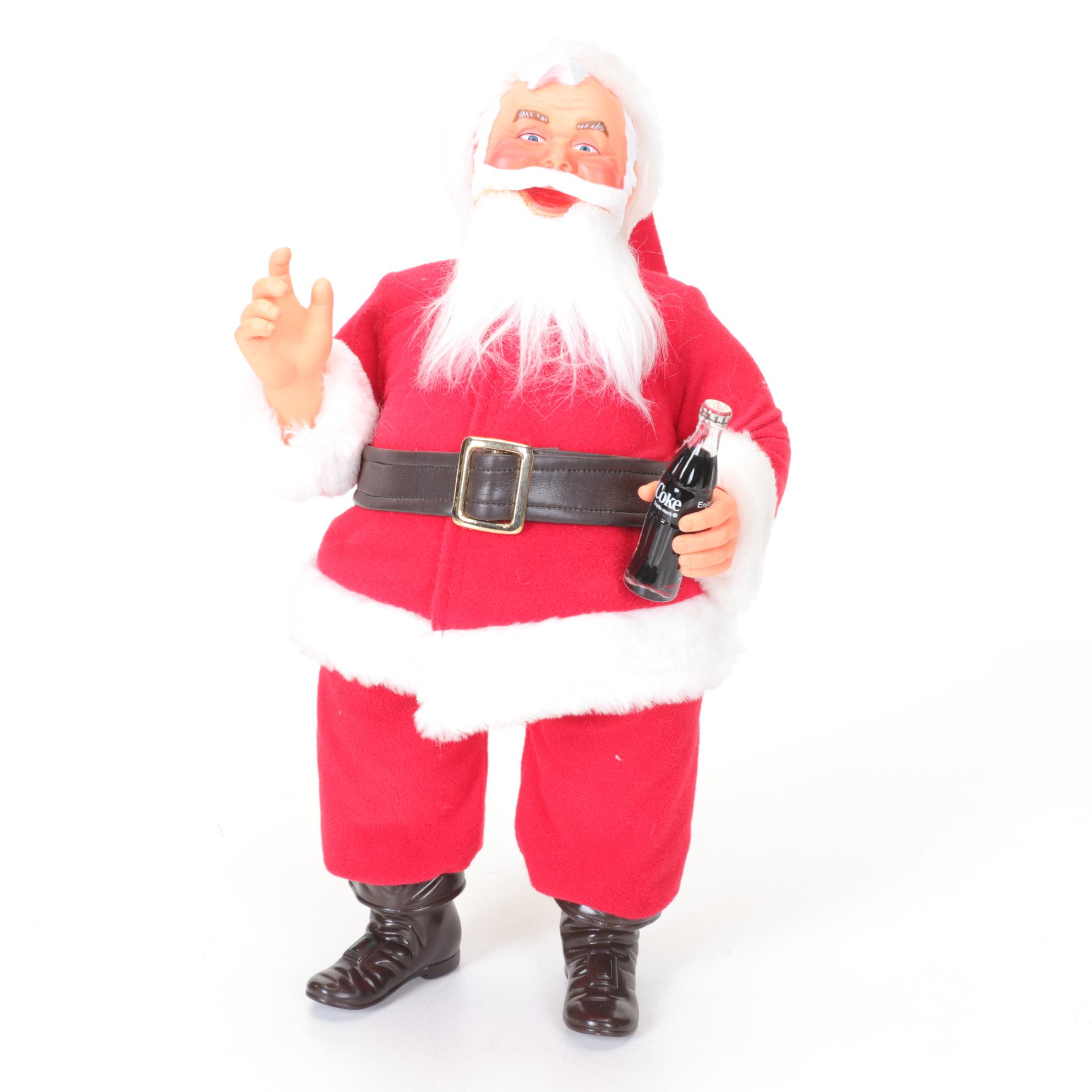 Coca-Cola Christmas Decorations with Three Banks, a Figurine, and a Bobblehead