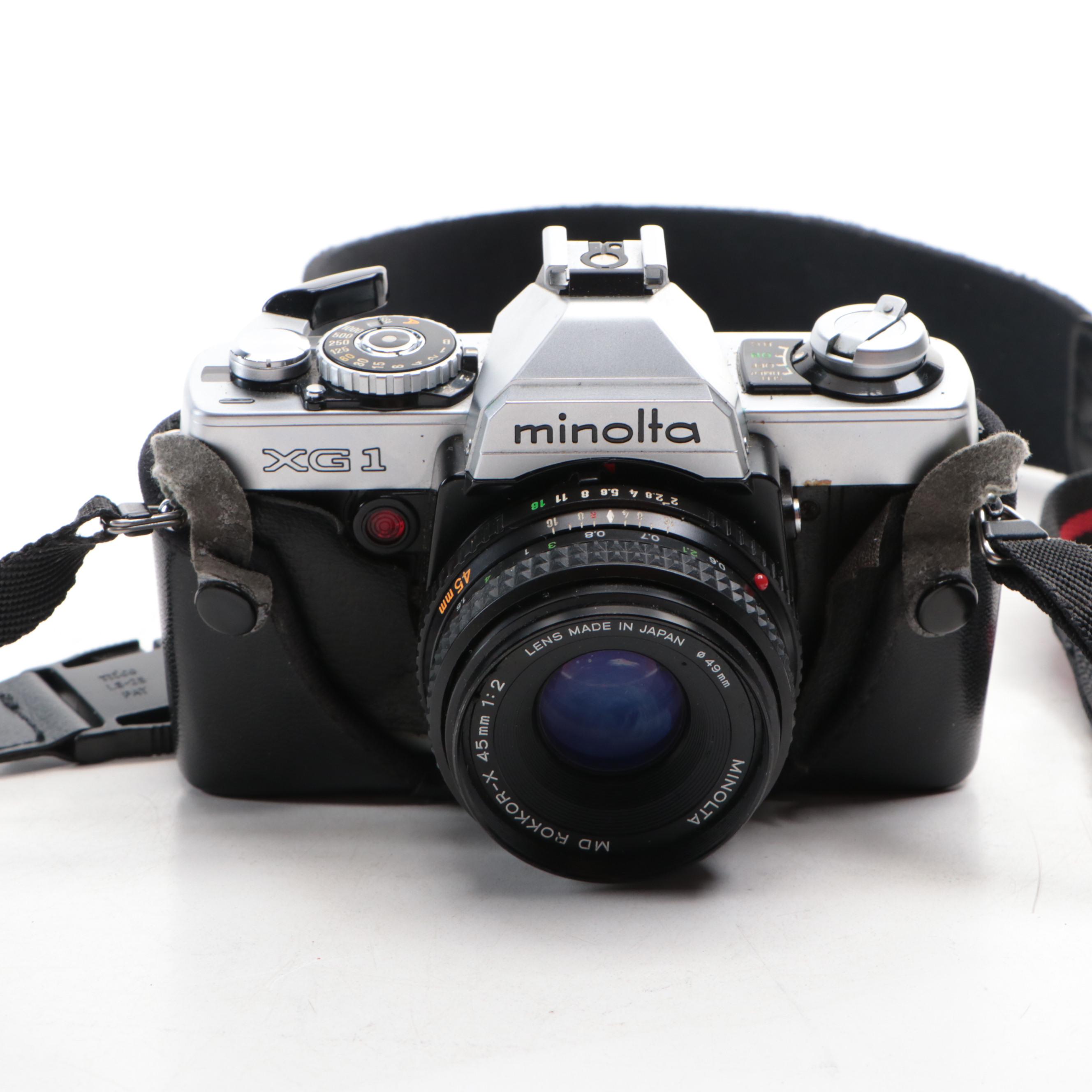 Minolta XG1 SLR Film Camera with 45 mm f/2 Lens with Carrying Case and Tripod