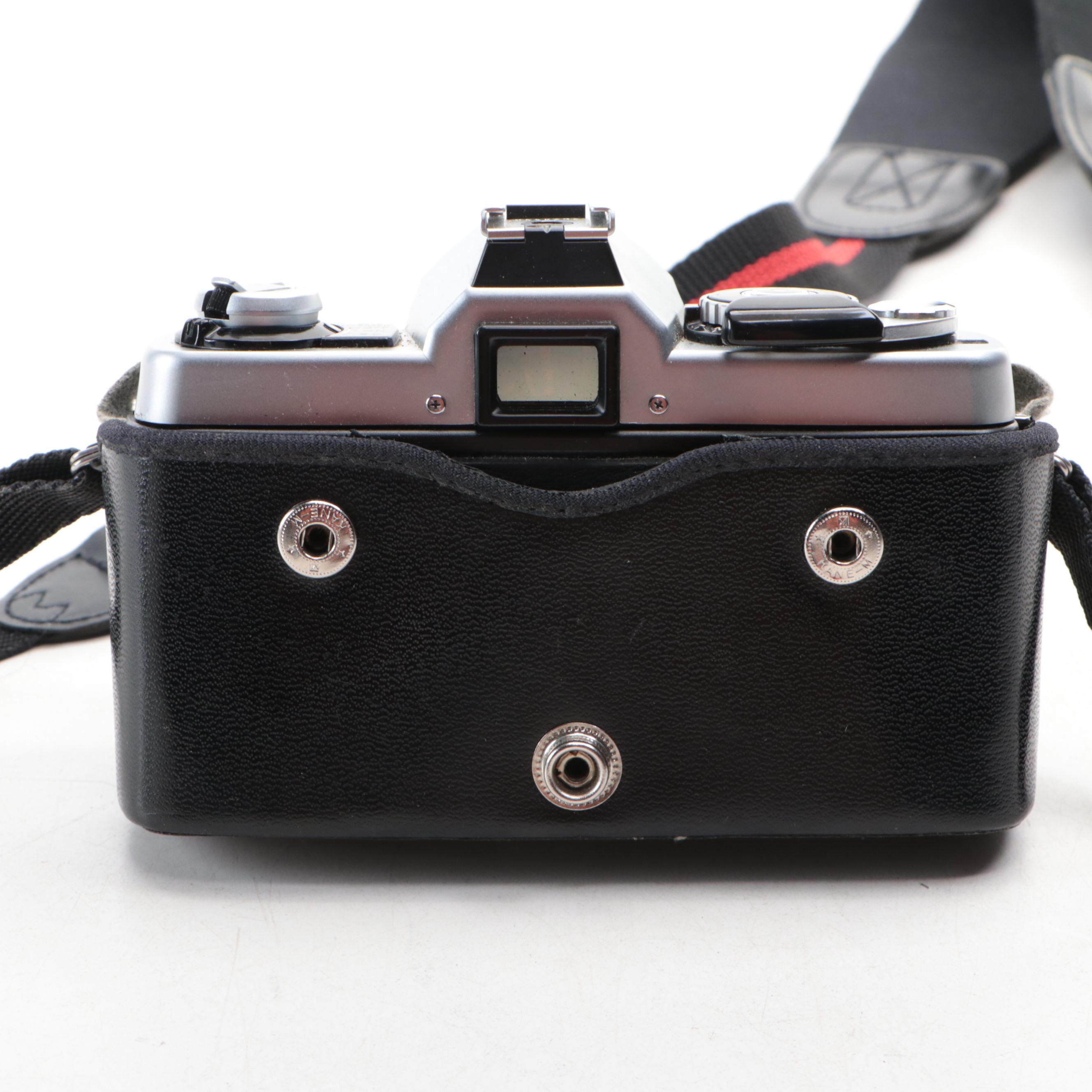 Minolta XG1 SLR Film Camera with 45 mm f/2 Lens with Carrying Case and Tripod