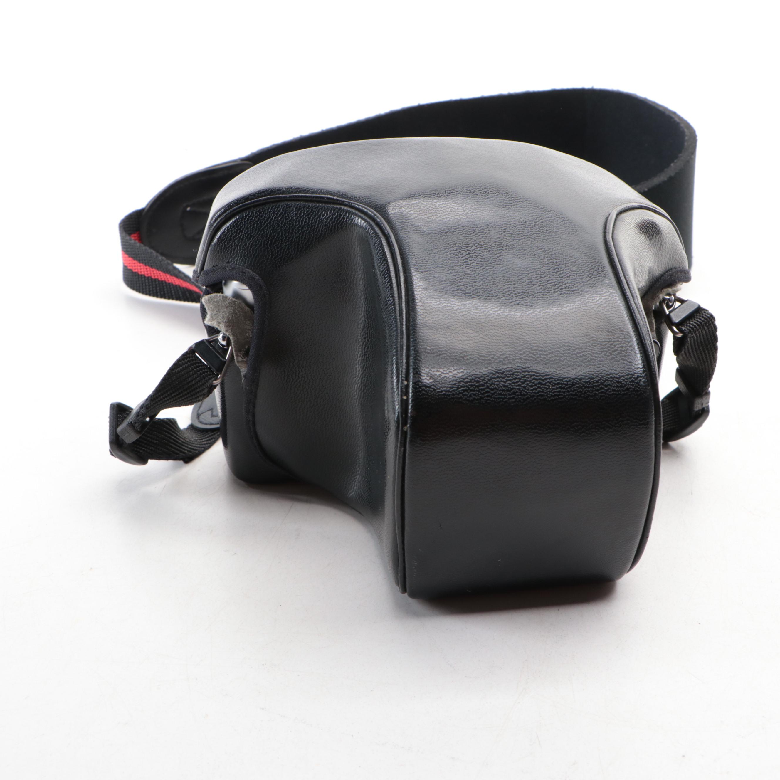 Minolta XG1 SLR Film Camera with 45 mm f/2 Lens with Carrying Case and Tripod