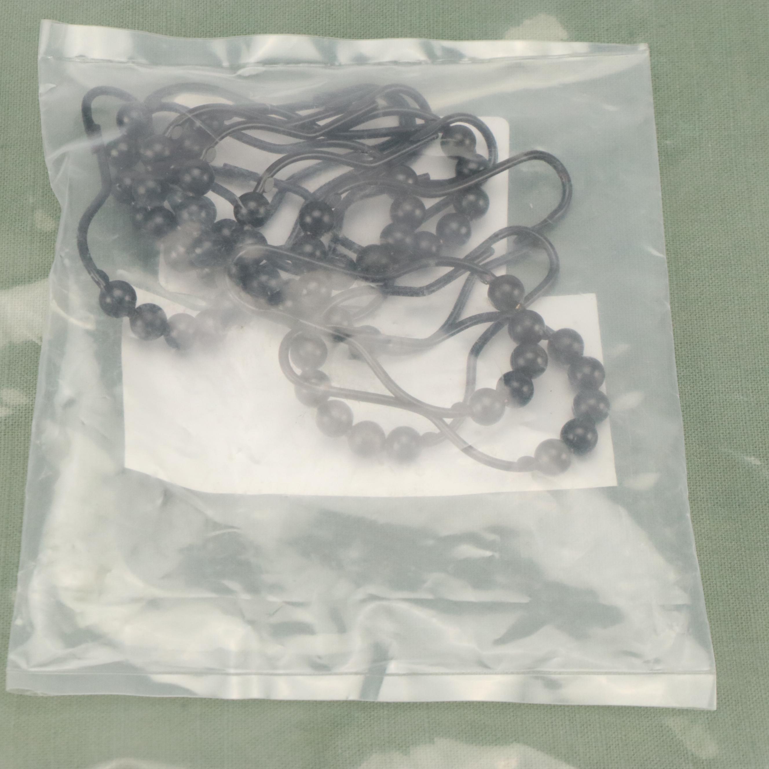 Sage Green Shower Curtain with Black Metal Rollerball Shower Curtain Rings