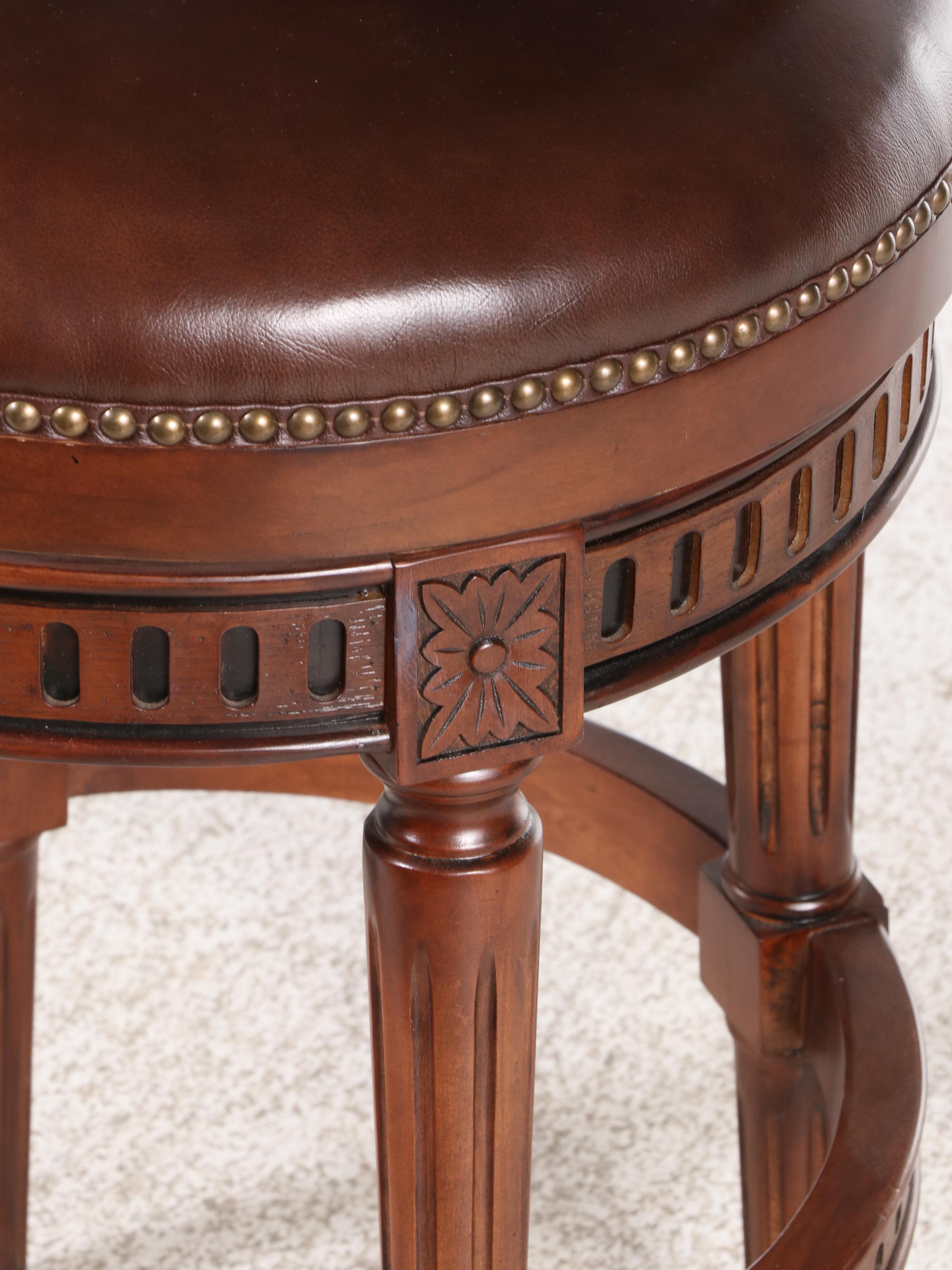 Three Frontgate Louis XVI Style Hardwood and Leather Swivel Bar Stools