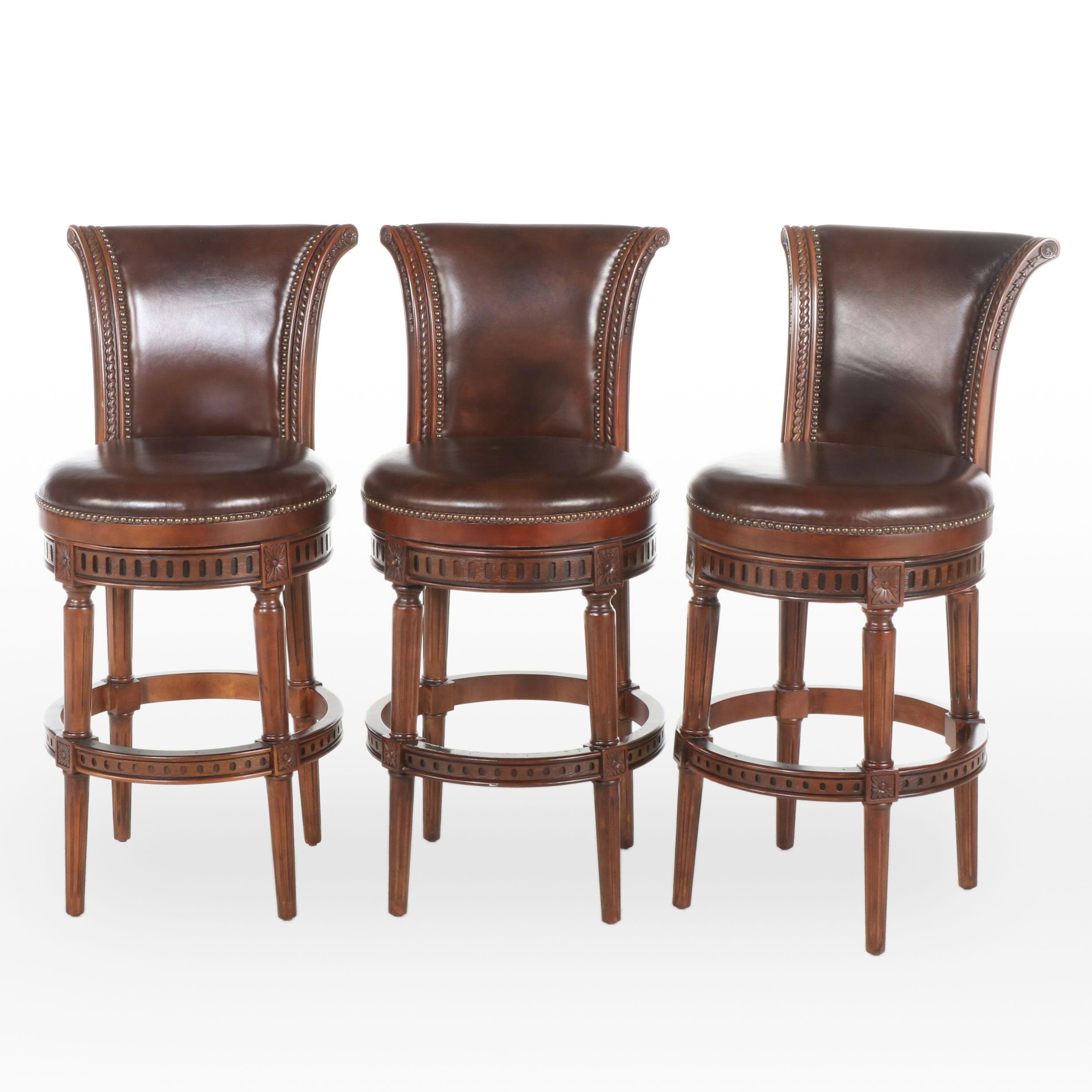 Three Frontgate Louis XVI Style Hardwood and Leather Swivel Bar Stools