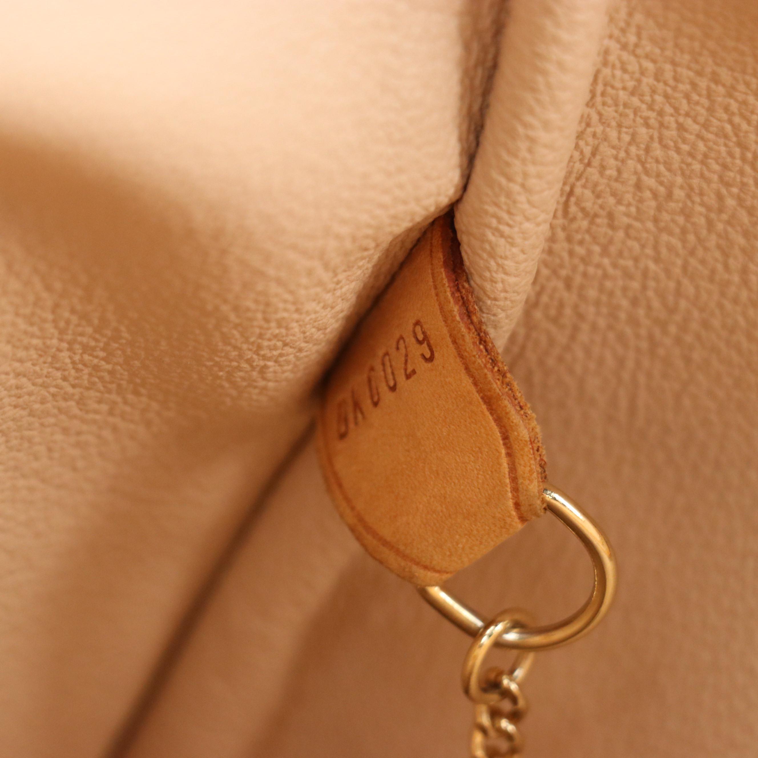 Louis Vuitton Marais GM Bucket Bag in Monogram Canvas and Vachetta Leather Trim