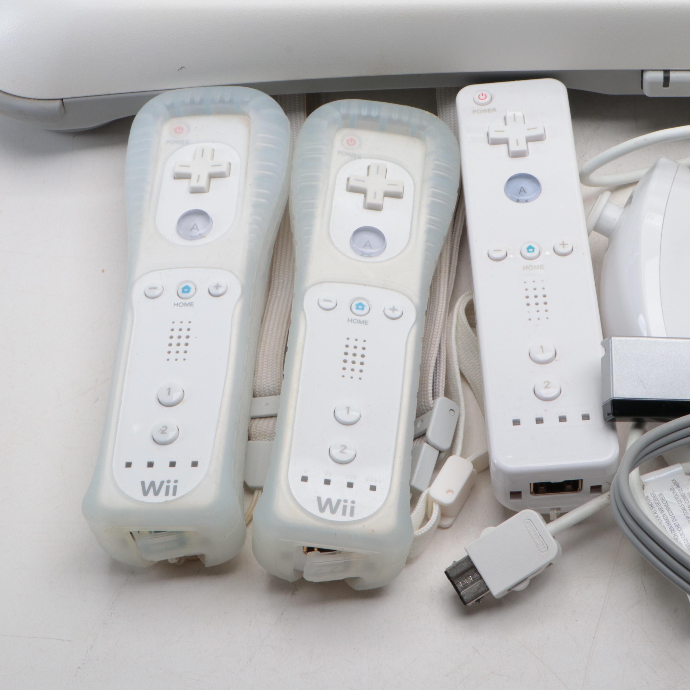 Nintendo Wii Console and Nintendo Wii Fit Board with More Accessories