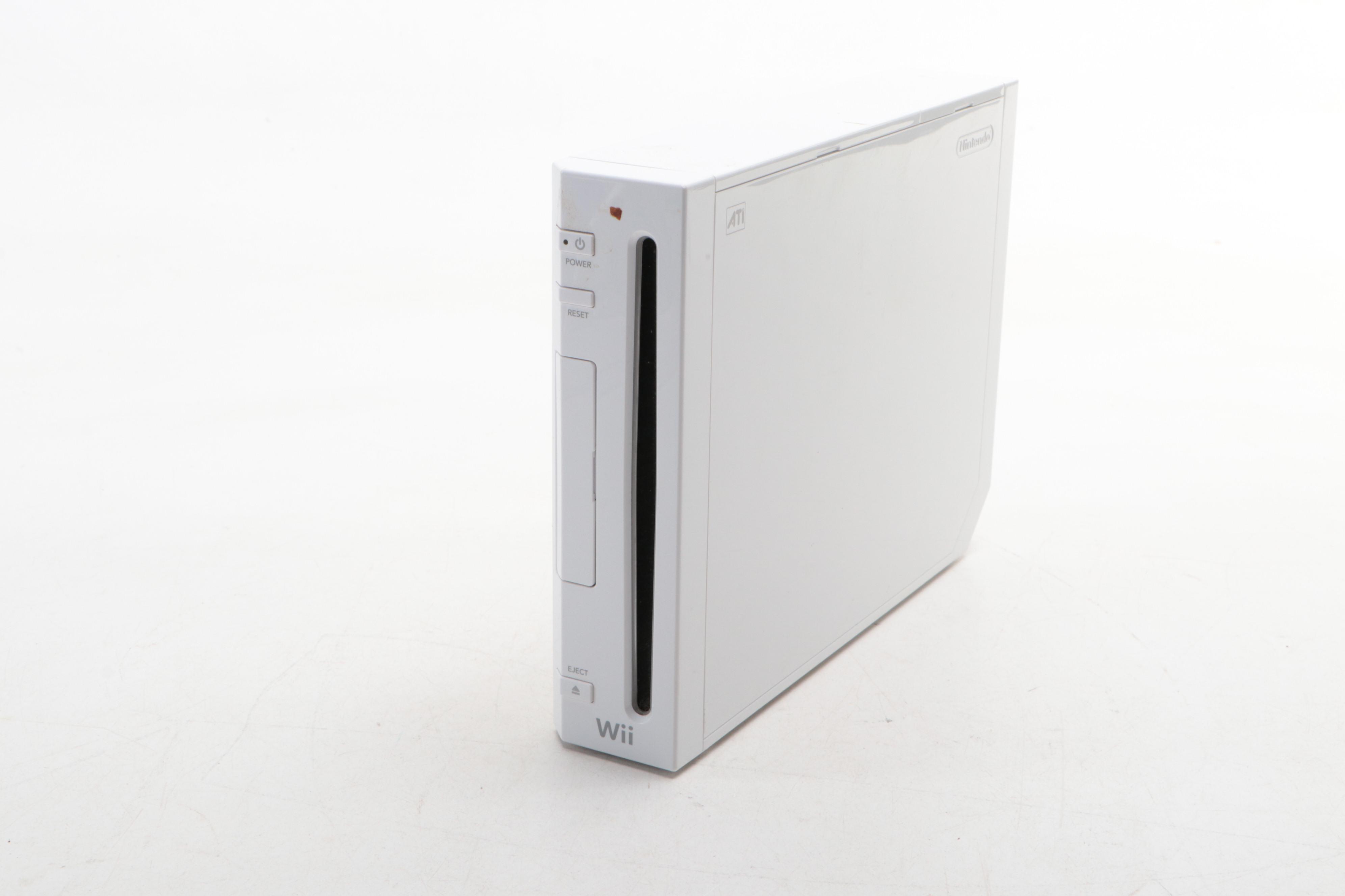 Nintendo Wii Console and Nintendo Wii Fit Board with More Accessories