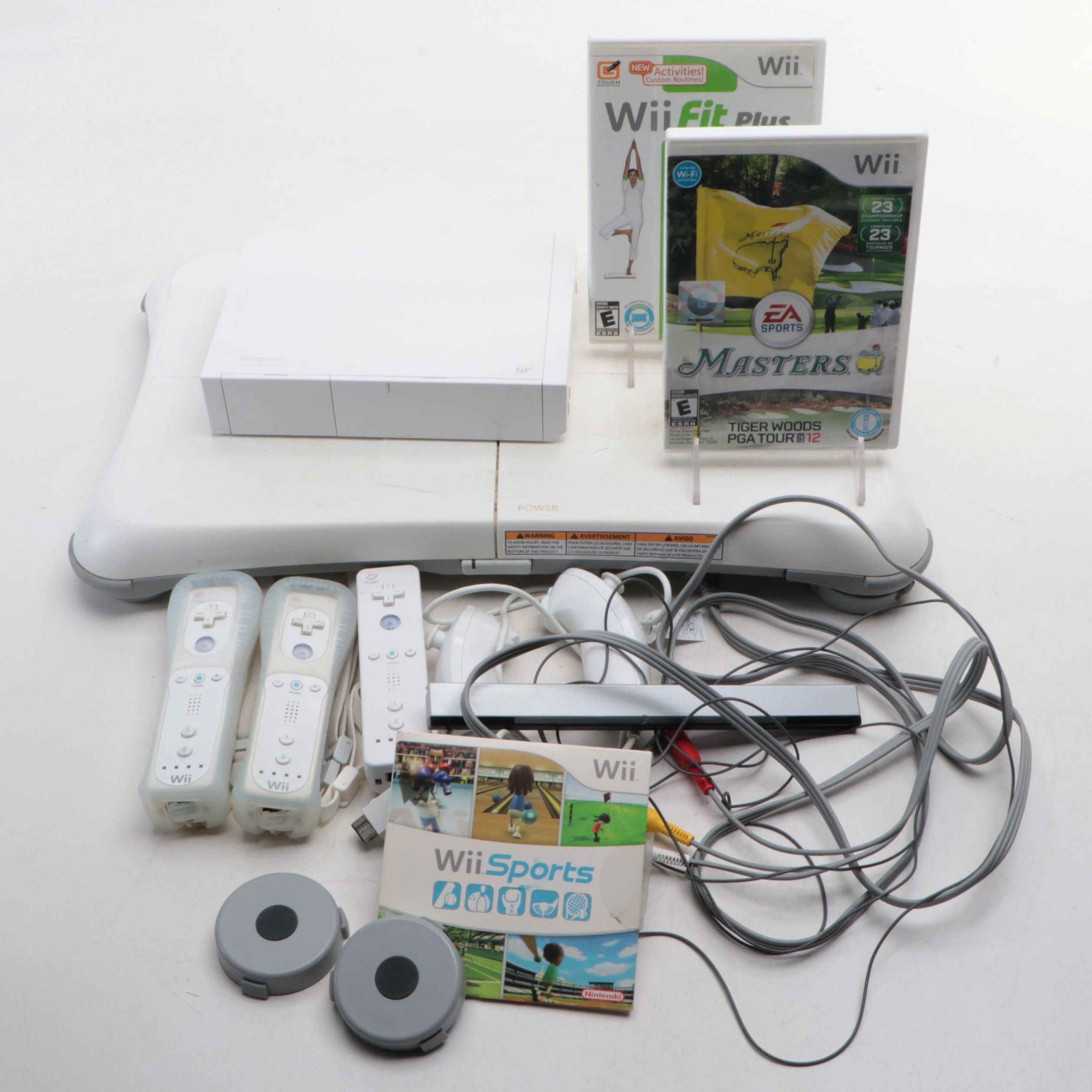 Nintendo Wii Console and Nintendo Wii Fit Board with More Accessories