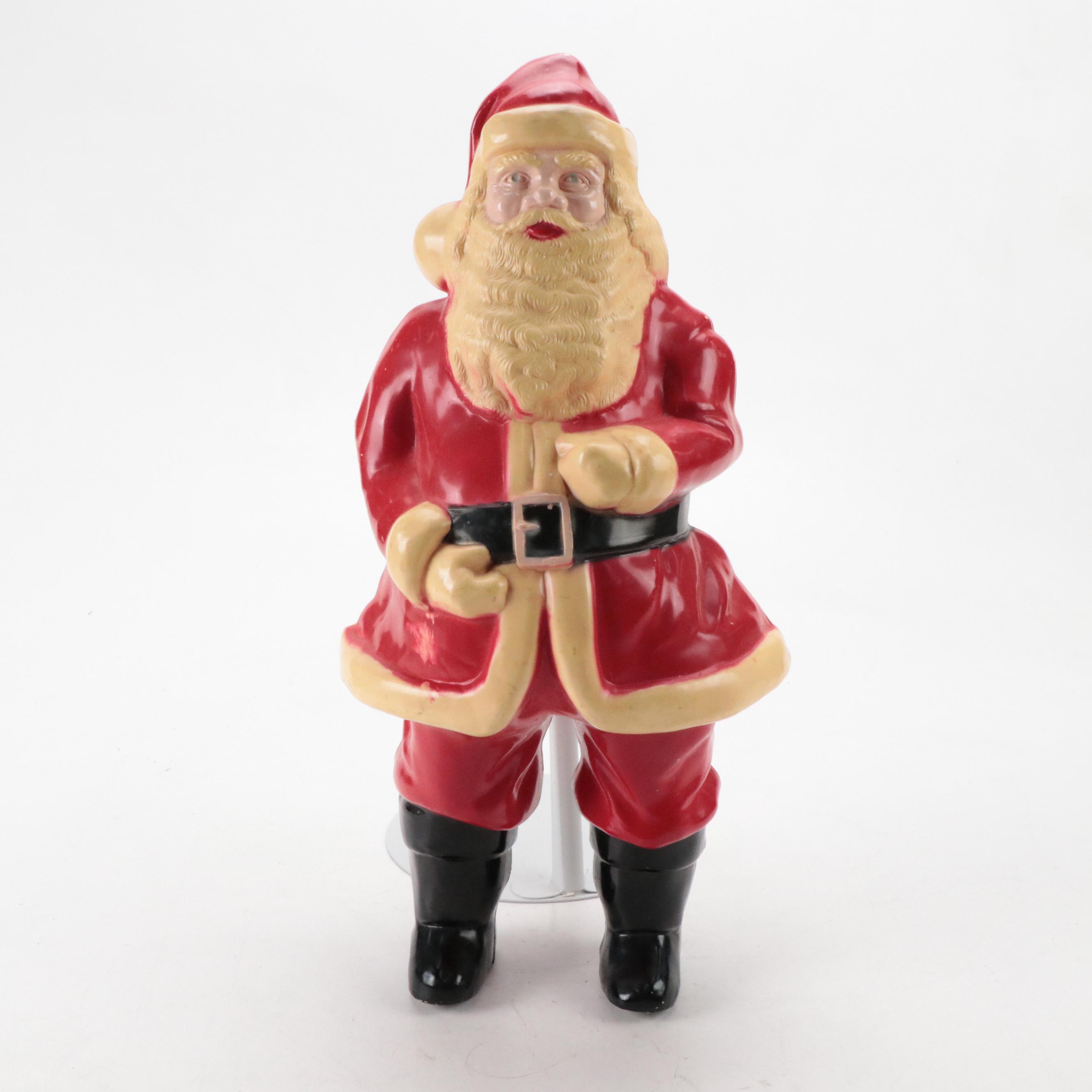 Illuminated Santa Figure and Christmas Bell Clusters with Holiday Accent Pillows