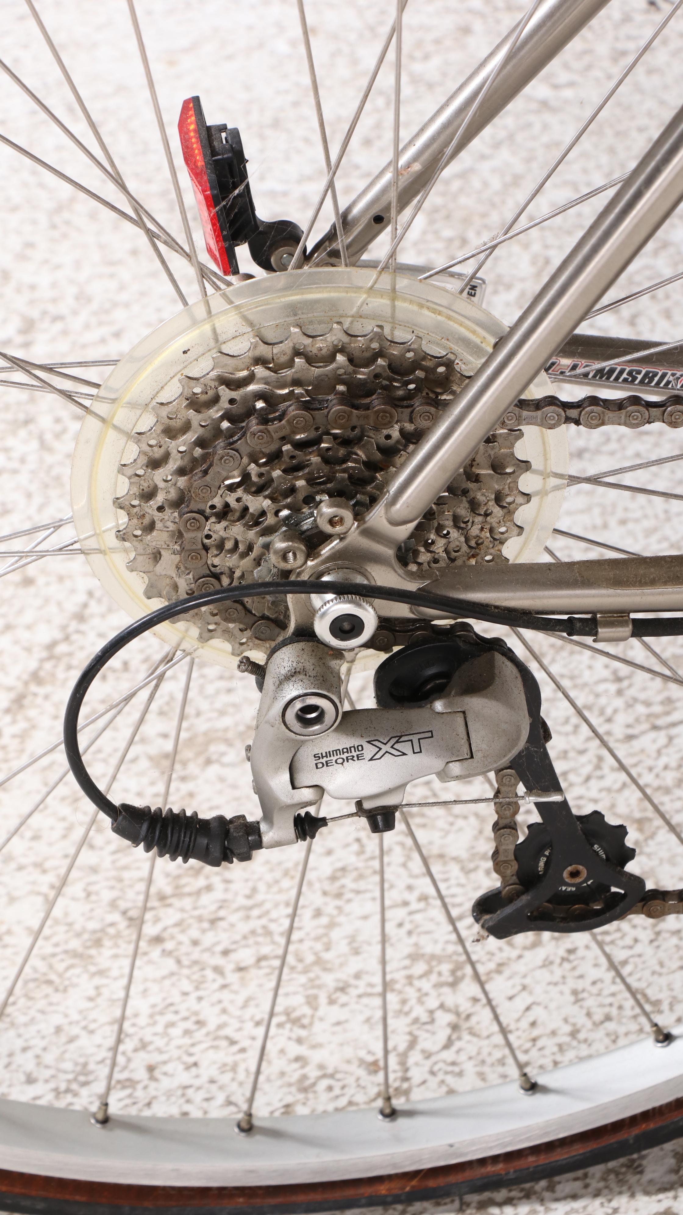 Jamis Coda Mountain Bike with Serfas Seat, Handlebar Reflector and Water Bottle Everything But