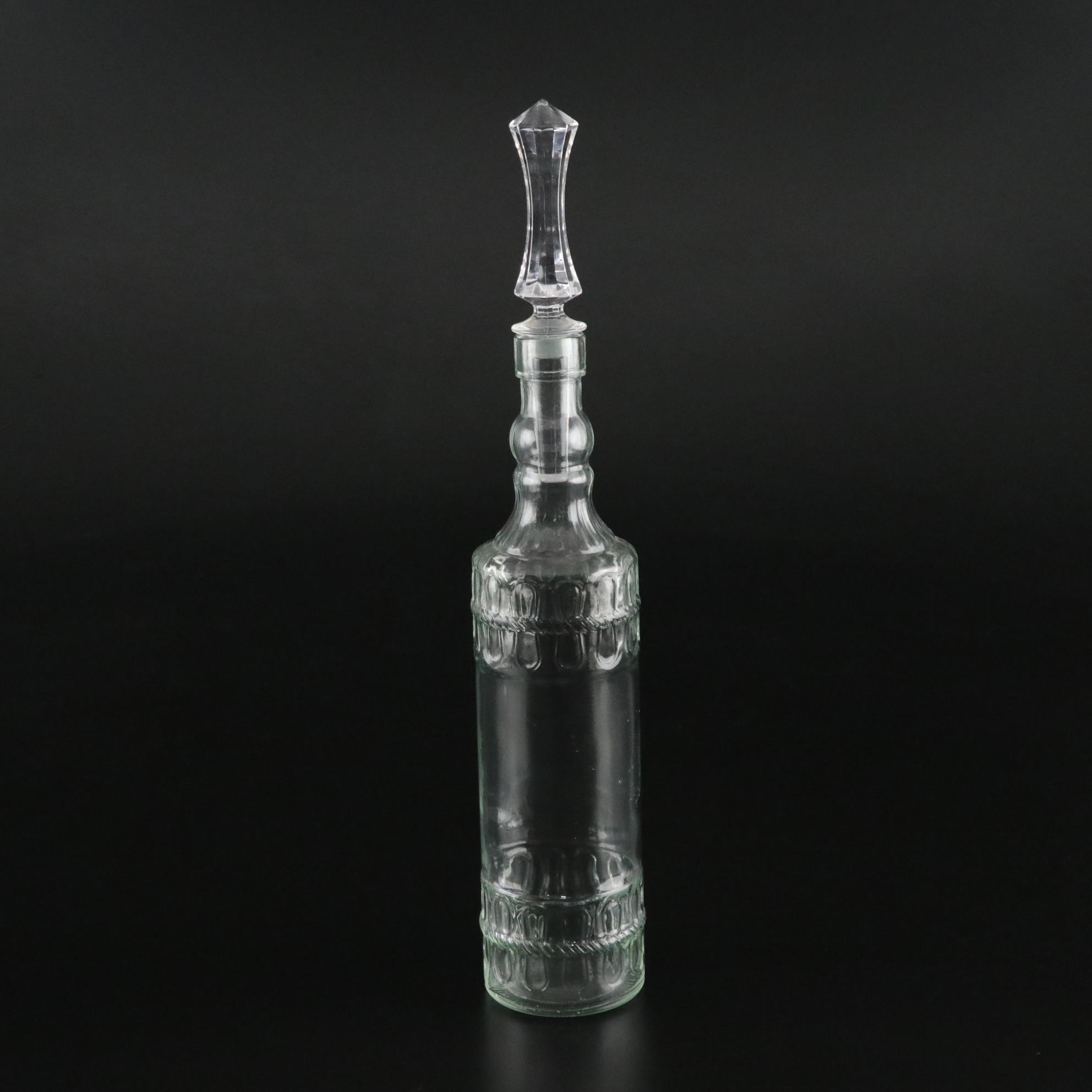 Pair of Molded Glass Bottles with Decorative Crystal Stoppers
