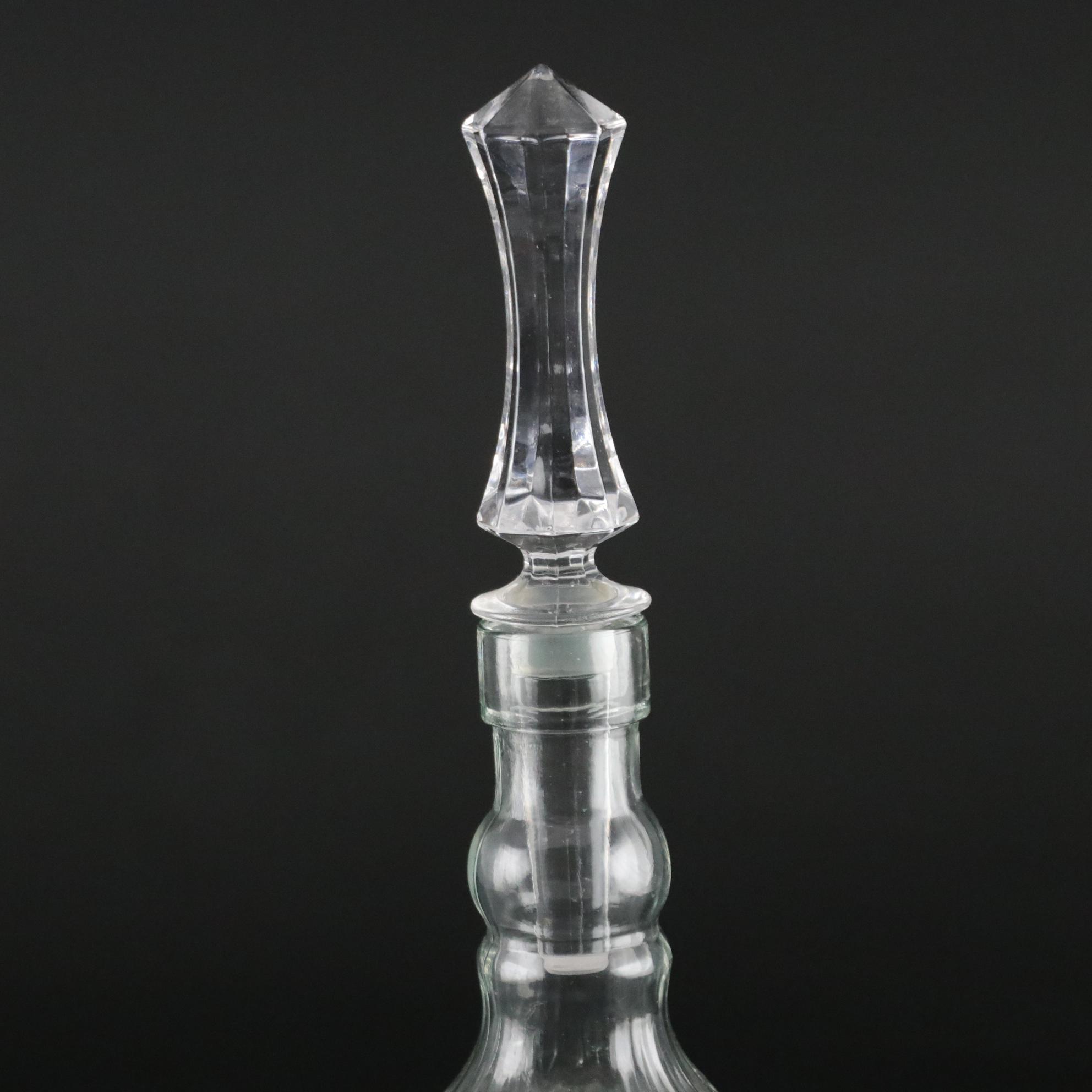 Pair of Molded Glass Bottles with Decorative Crystal Stoppers