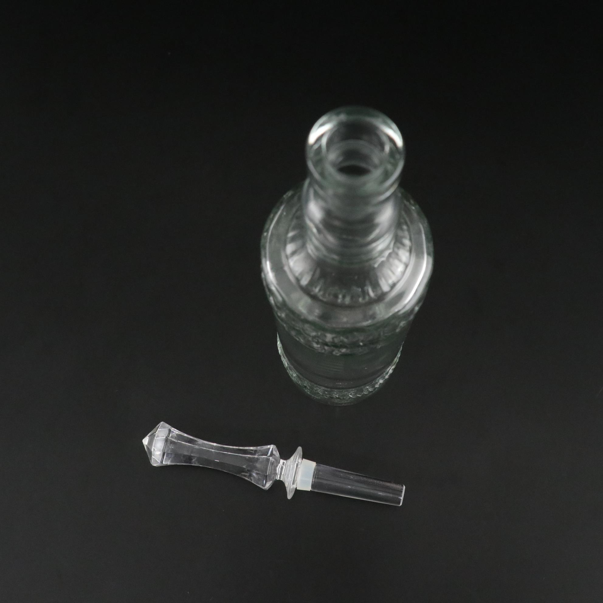 Pair of Molded Glass Bottles with Decorative Crystal Stoppers